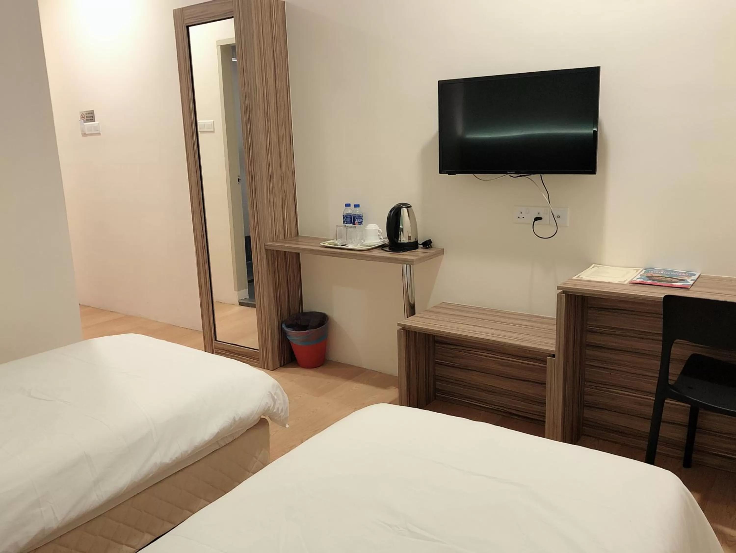 Bed in Tumike Hotel Bentong