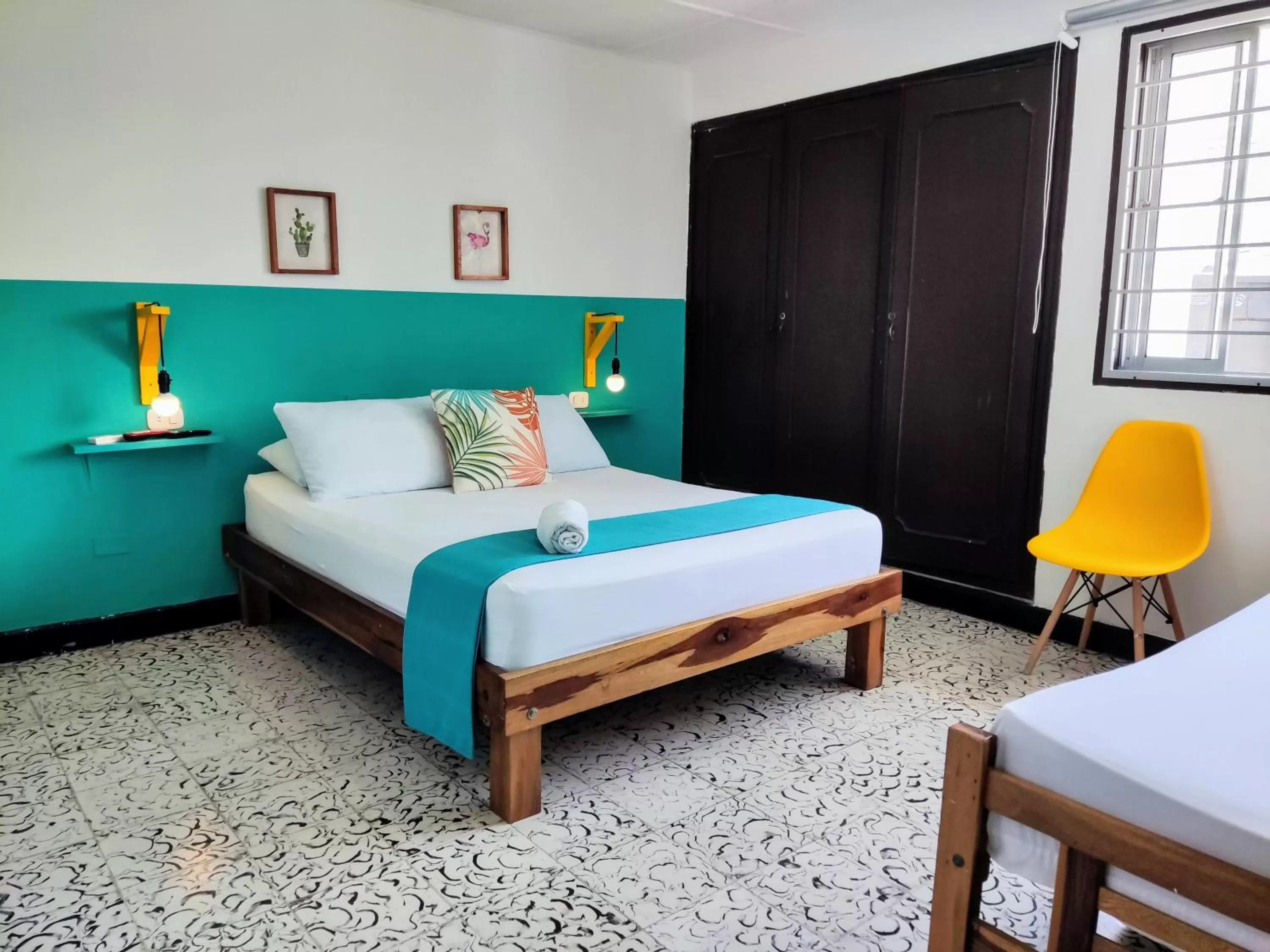 Bed in Bona Vida Hotel