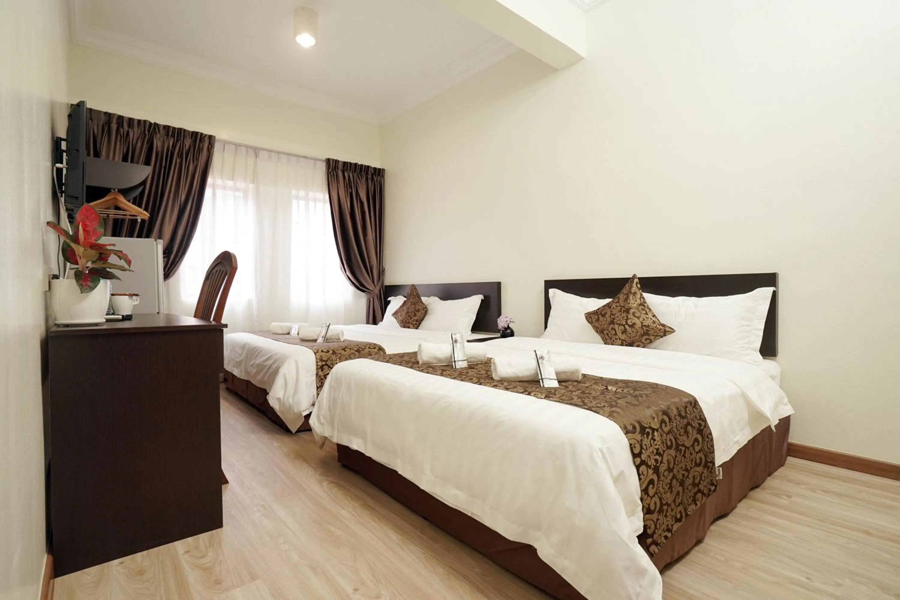 Photo of the whole room, Bed in RJ Hotel Kulai