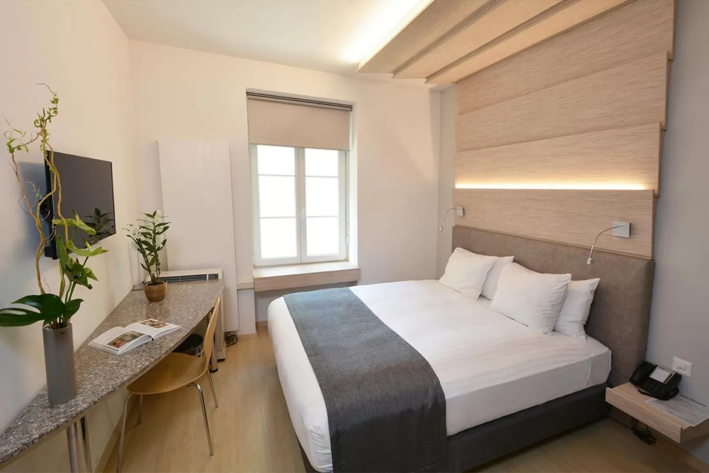 Bed in Hotel des Alpes