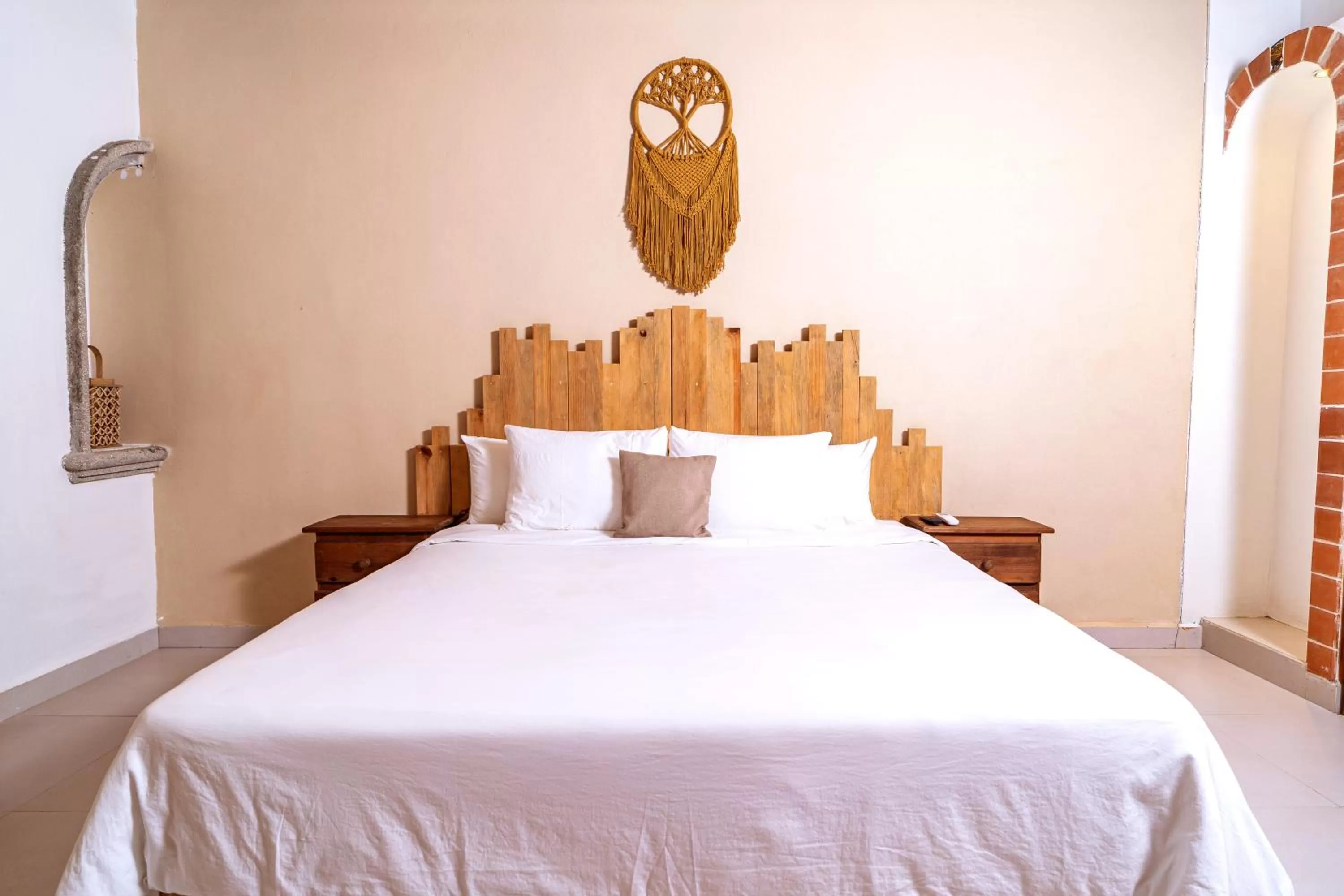 Bed in Enigmatic Hotel Experience