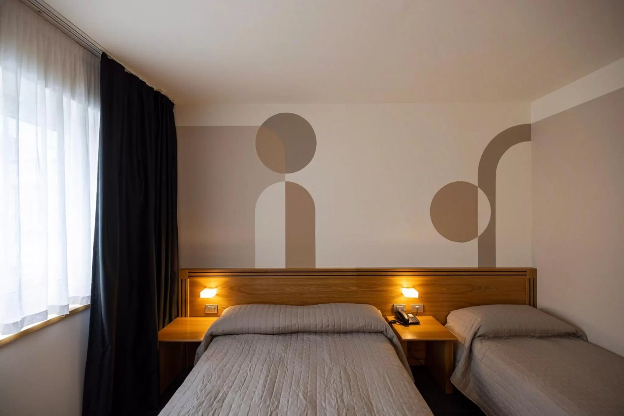 Bed in Hotel Europa Belluno