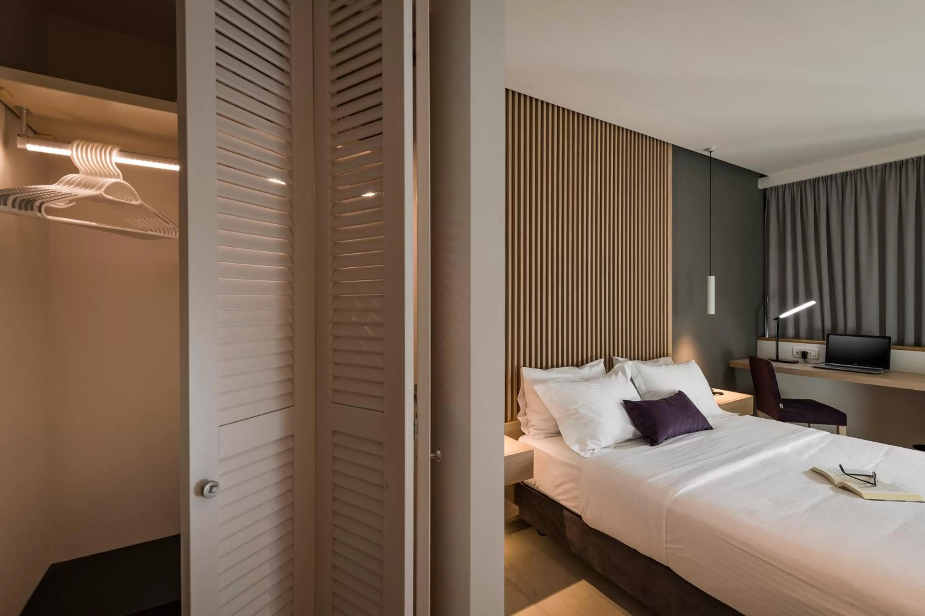 Bed in Trianon Luxury Apartments & Suites