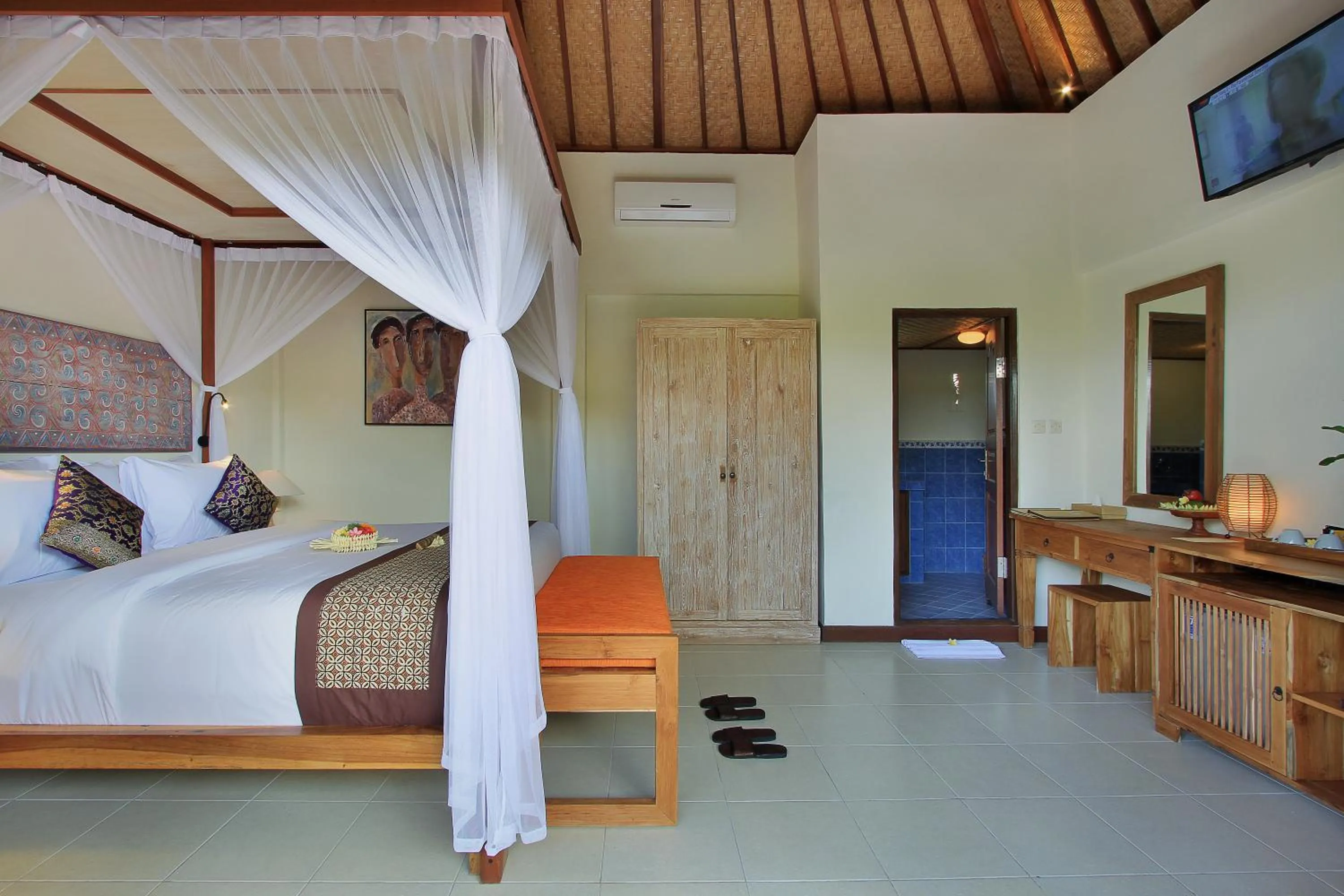 Bed in D'Legon Villas