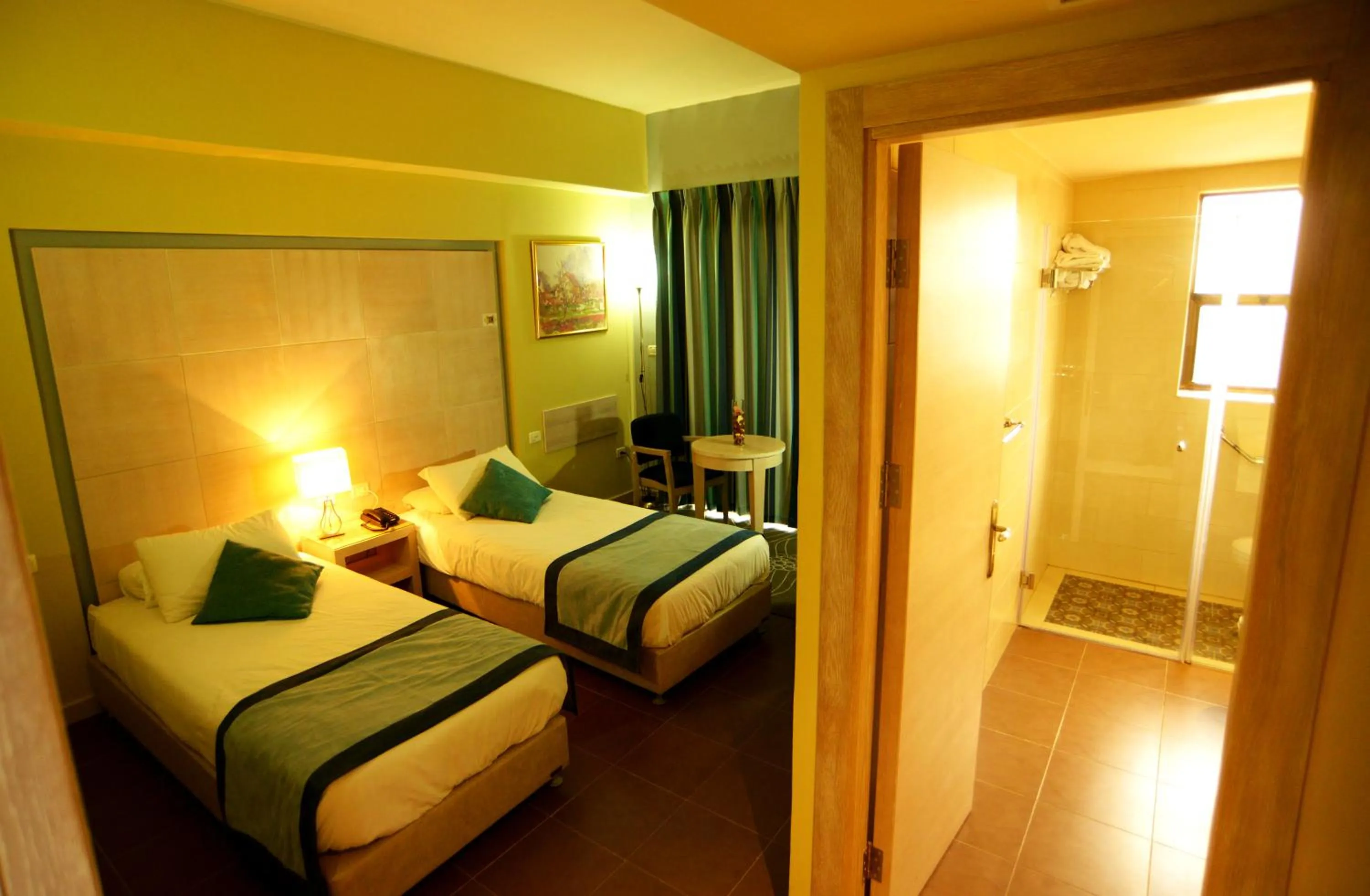 Photo of the whole room, Bed in Holy Land Hotel