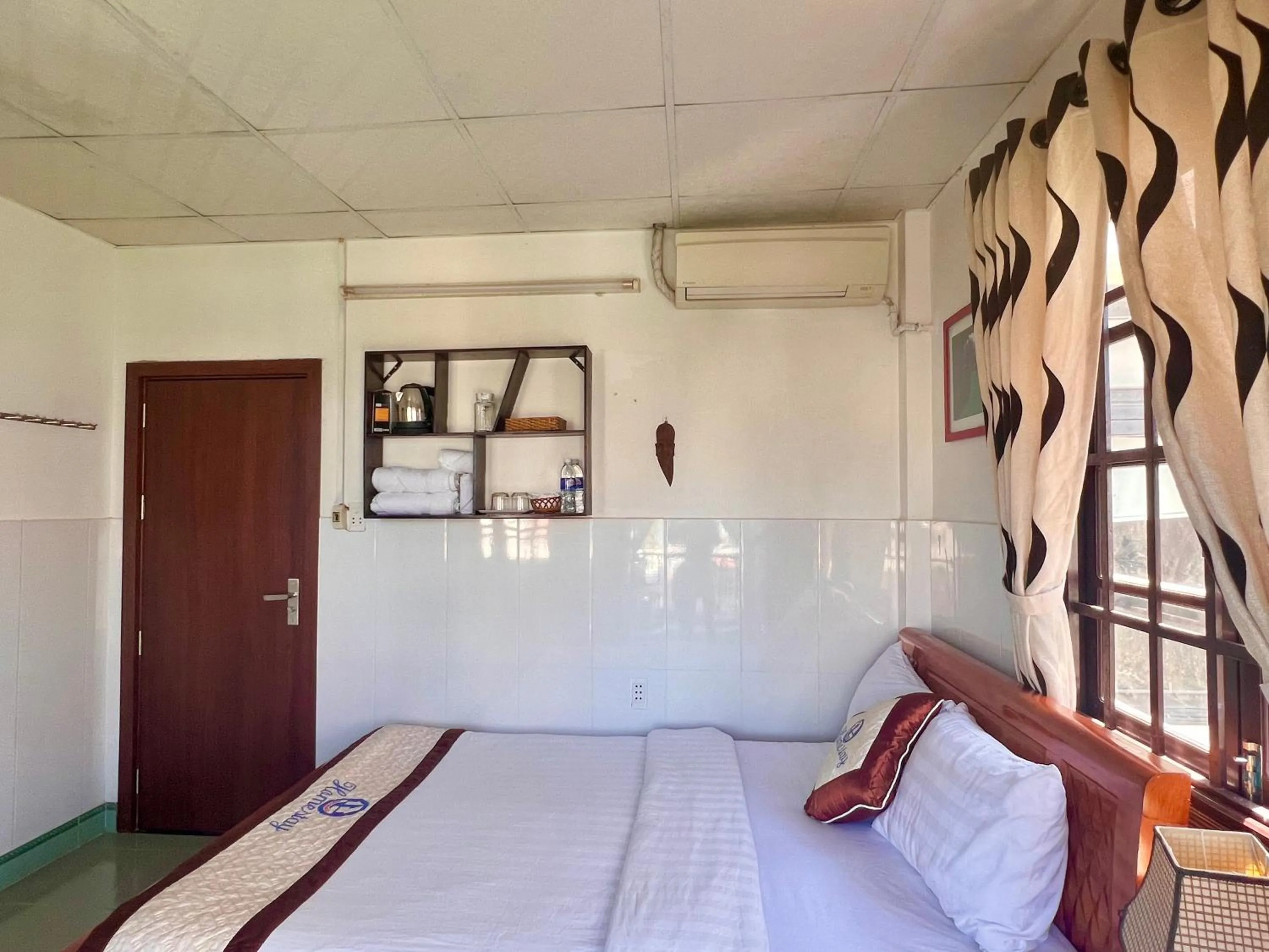 air conditioner, Bed in Hoi An Ngo Homestay