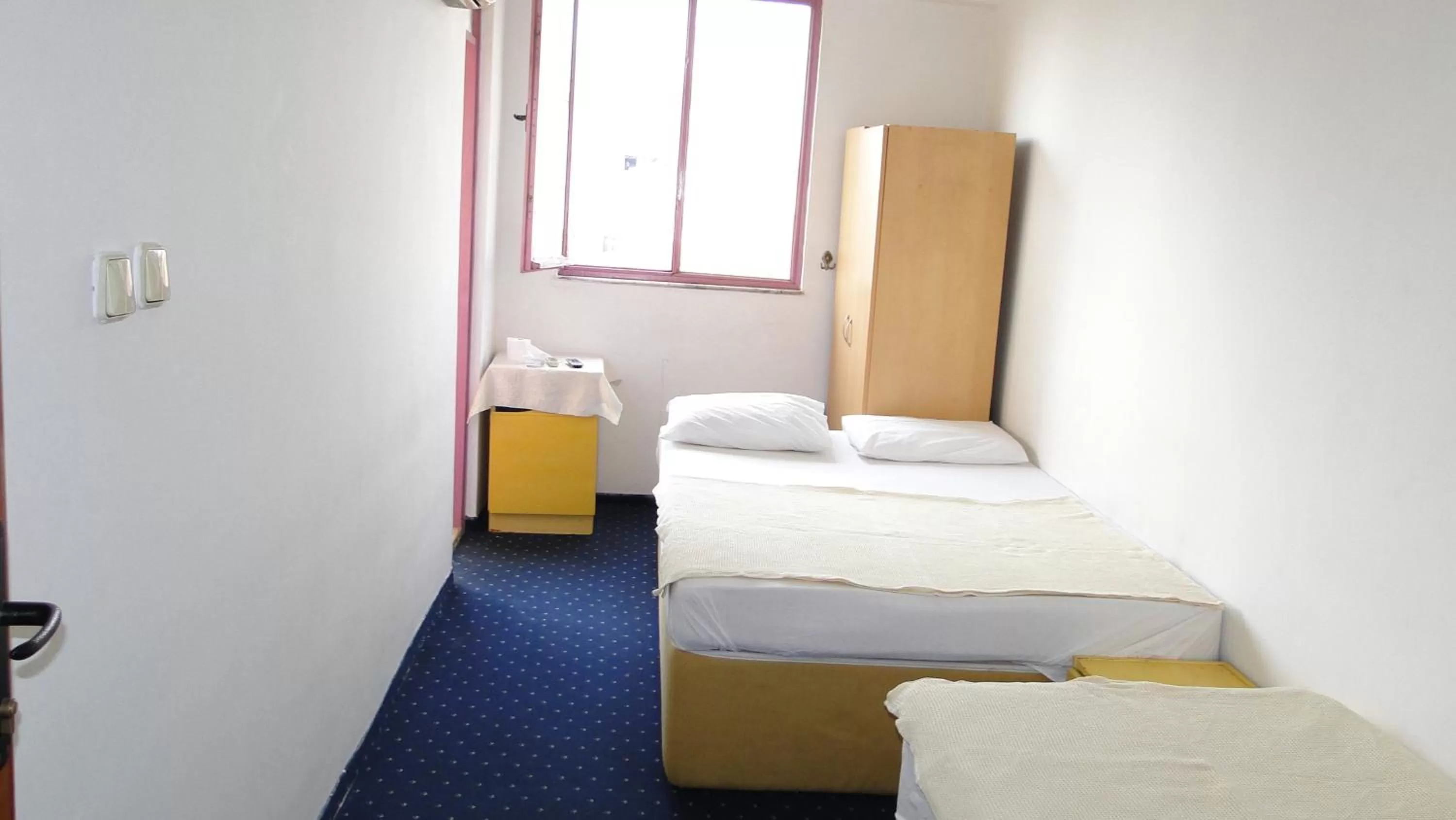 Bed in Sunrise Hotel