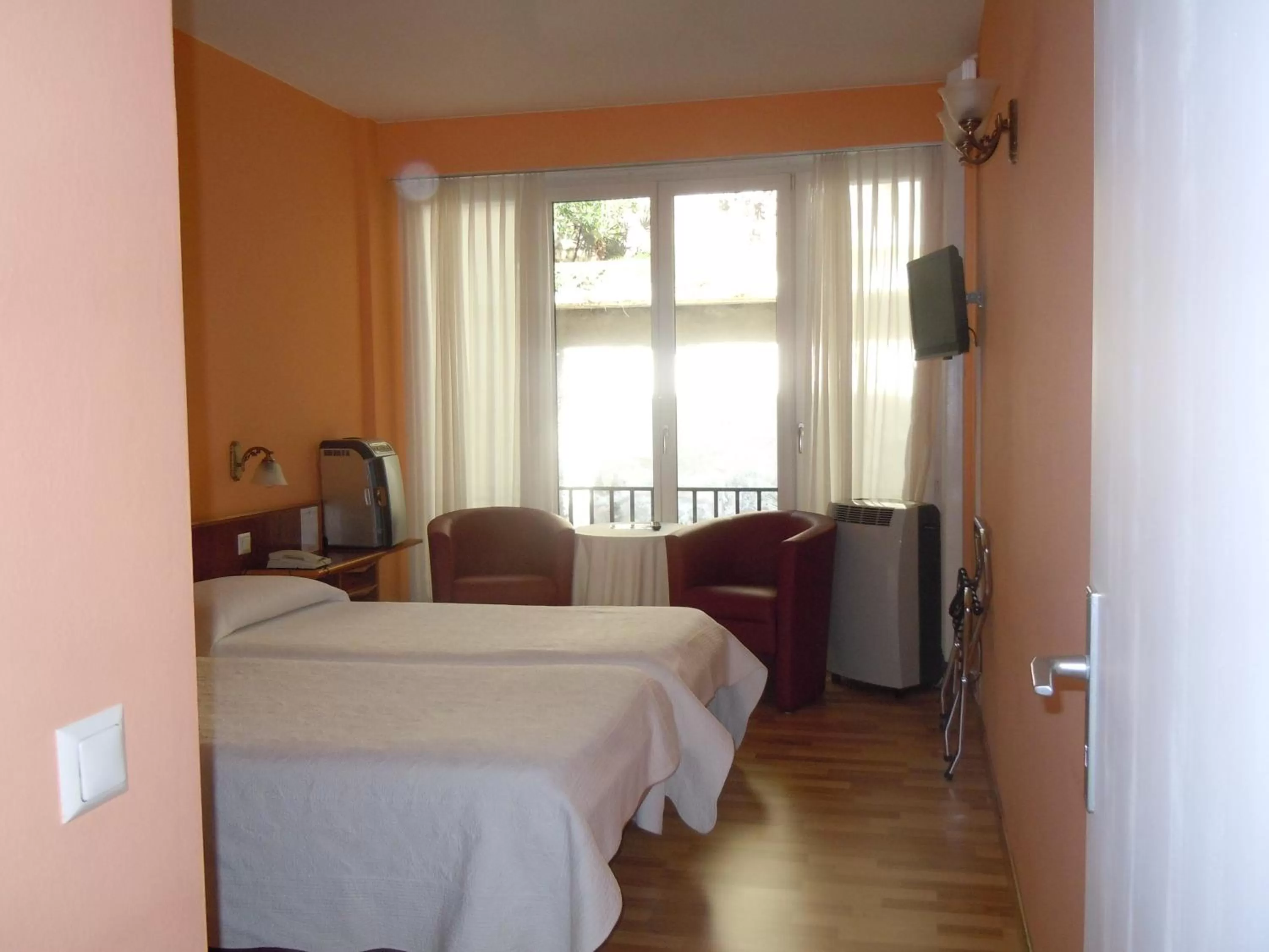 Bed in Swiss Lodge Nassa Garni