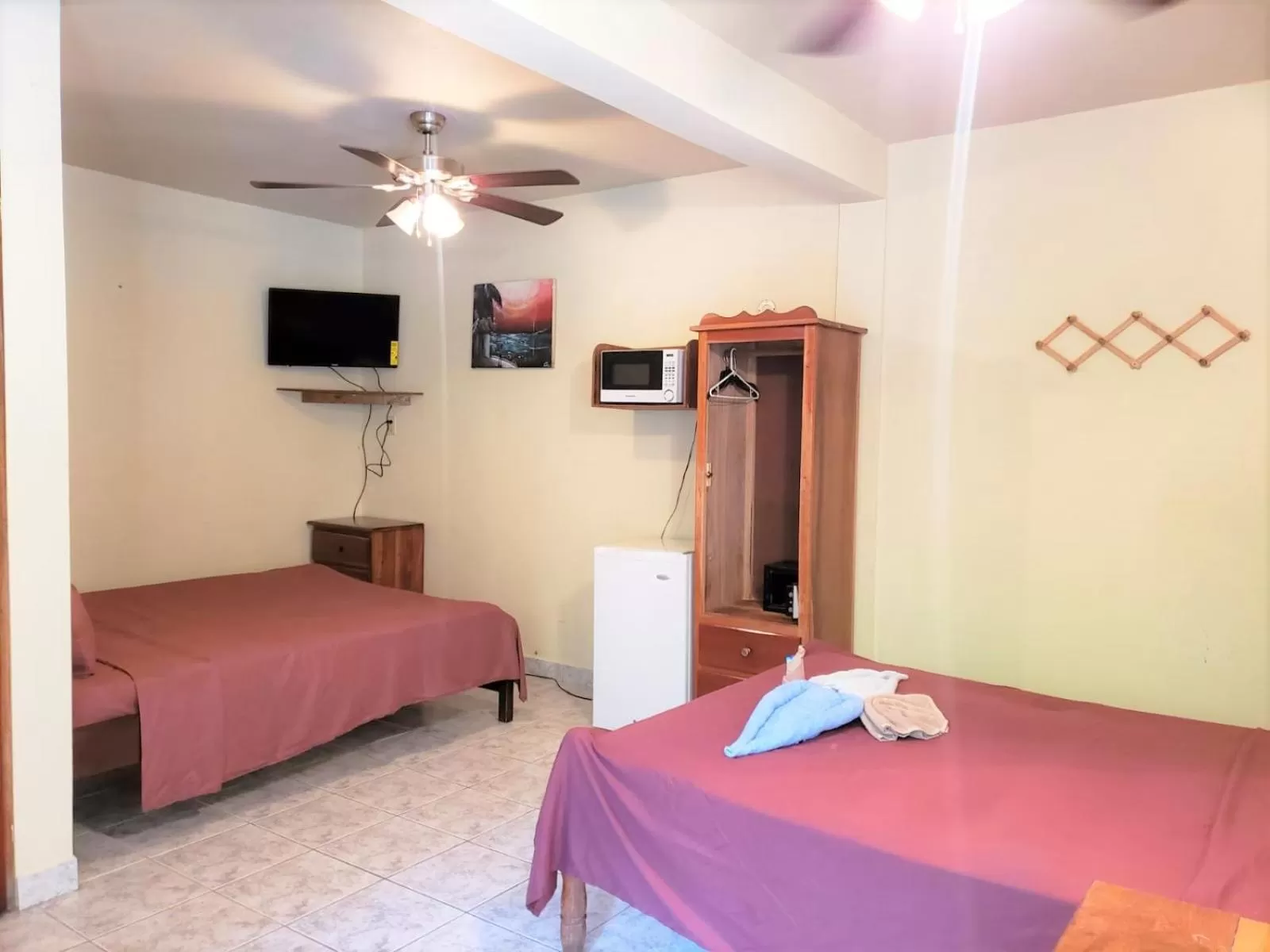 Bed in Beach Side Condos Caye Caulker by CCVH
