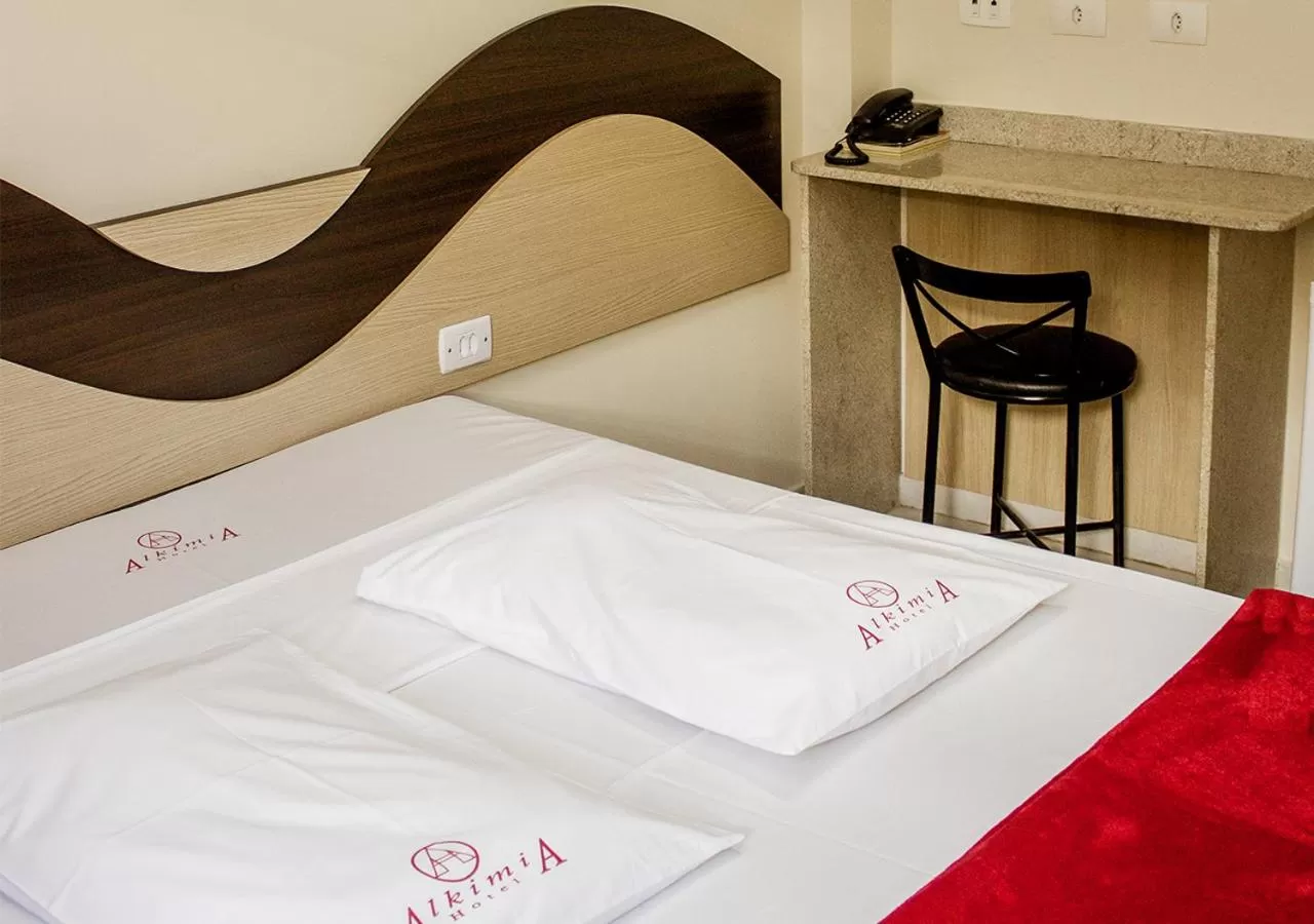 Bed in Alkimia Hotel