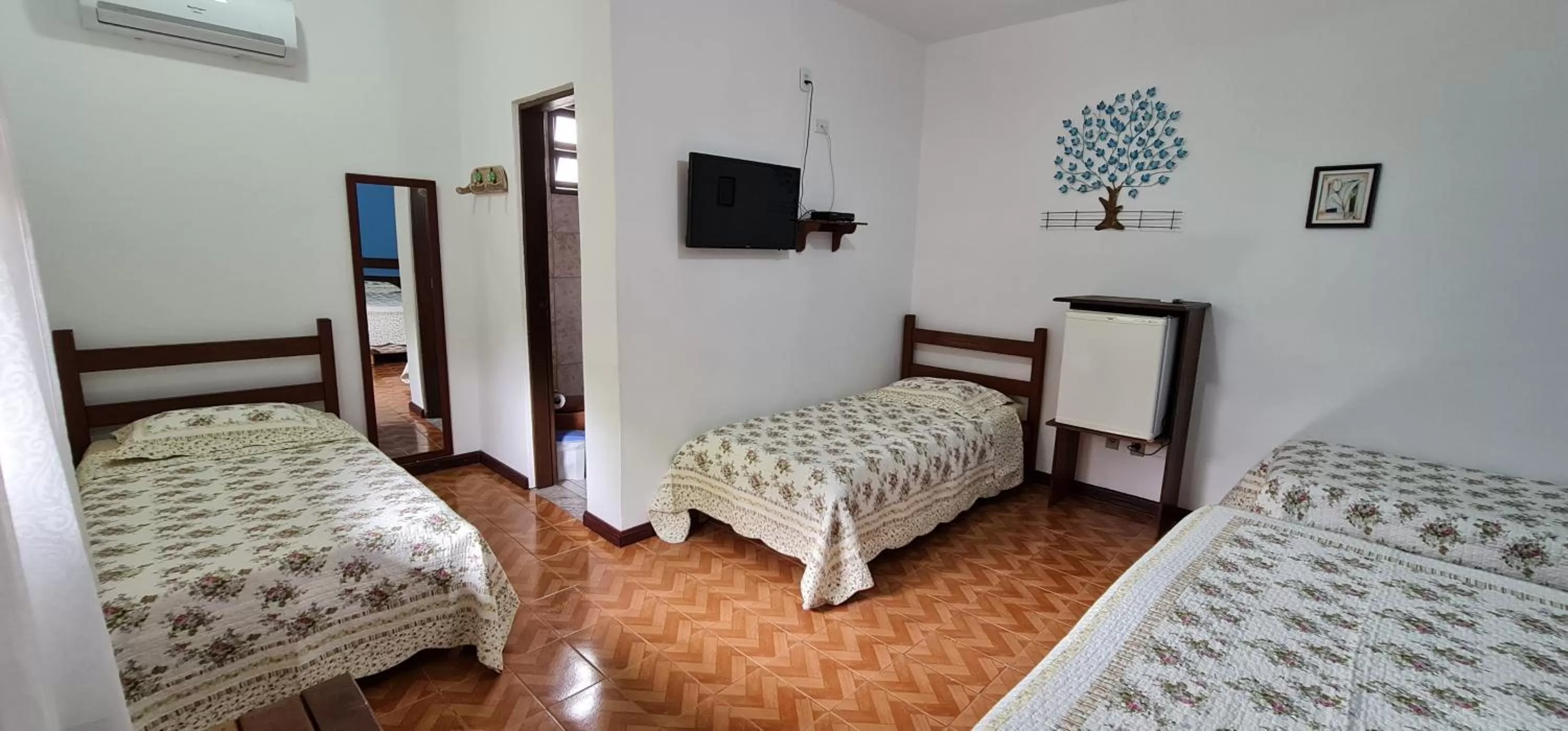 Bed in Pousada Flor de Paraty