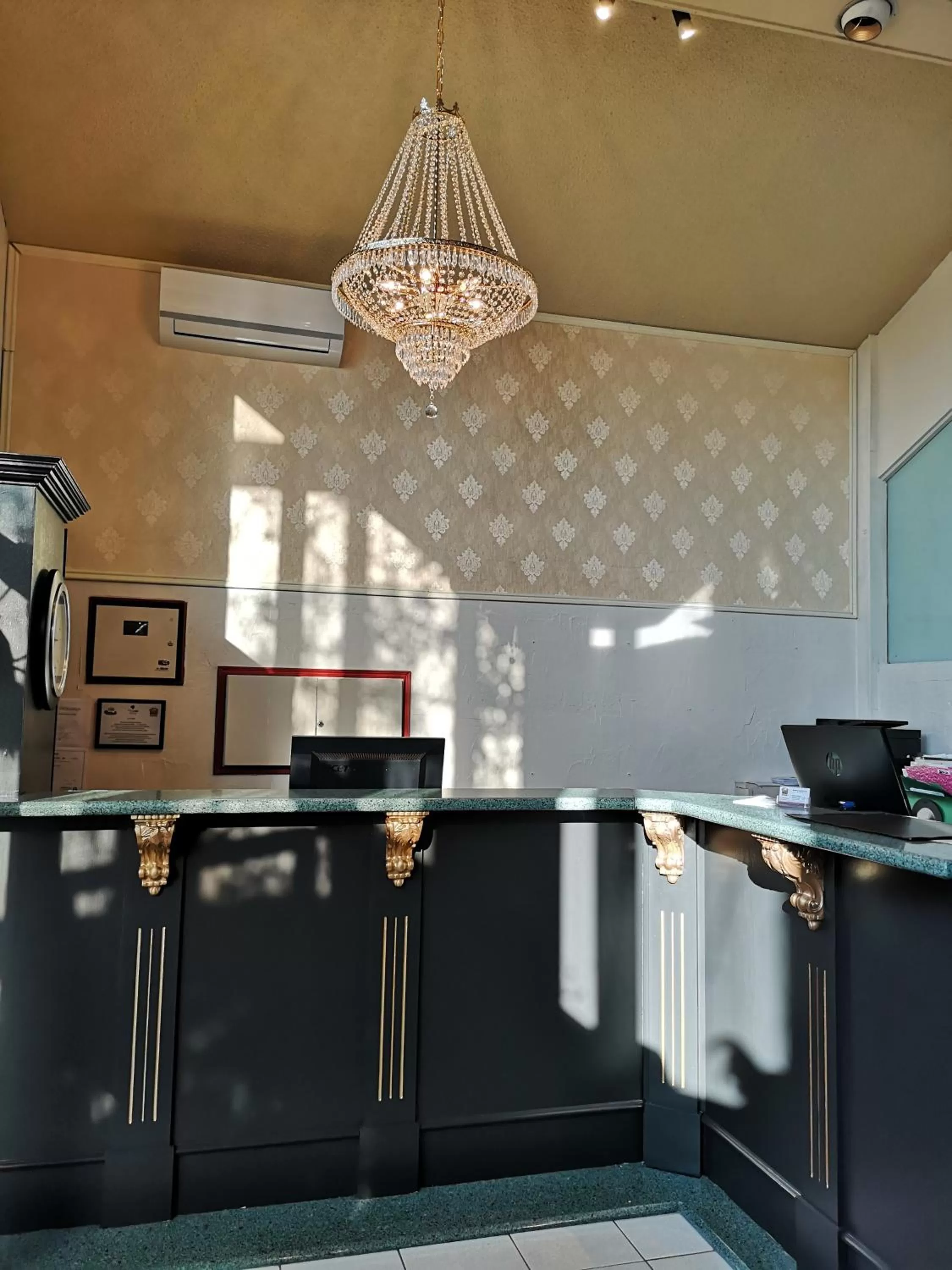 Lobby or reception in Hotellerie Jardins de Ville