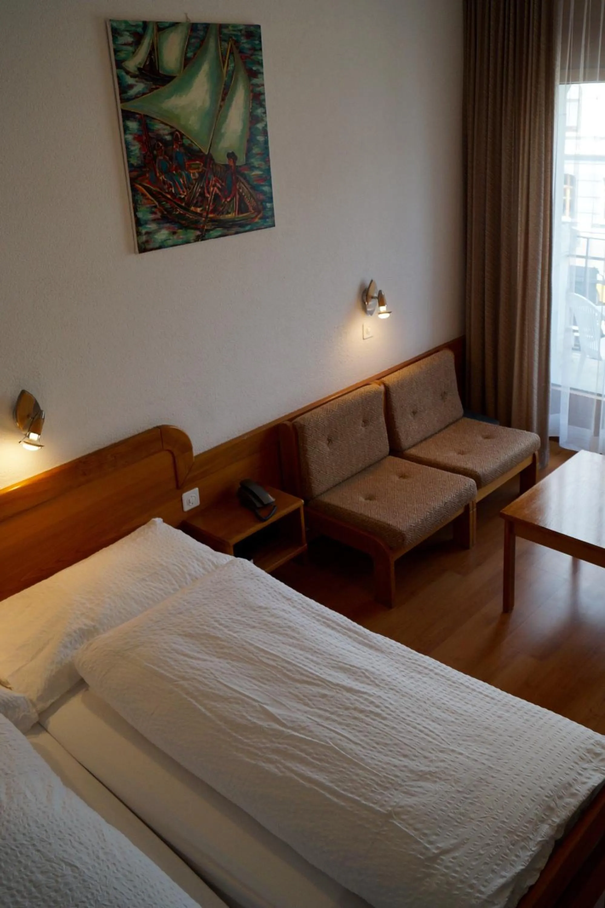Seating area, Bed in Hotel Victoria