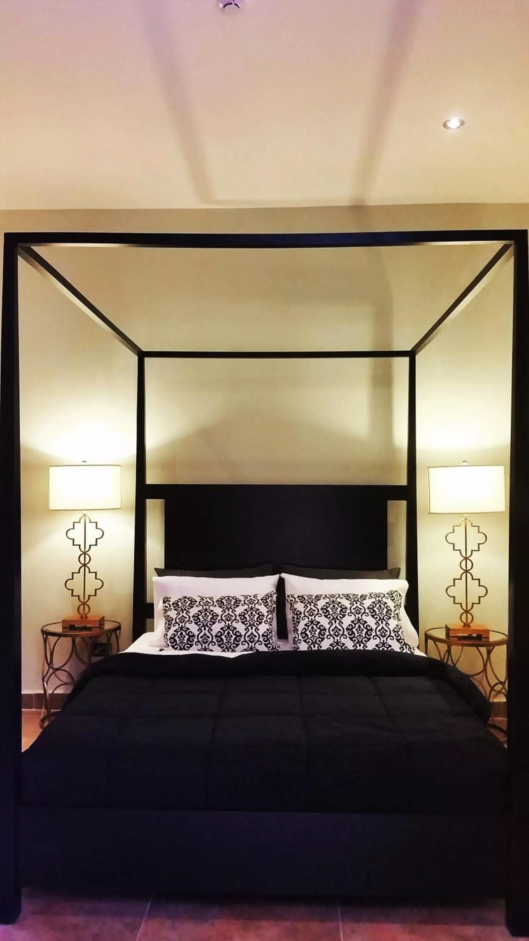 Bed in La Isabela Suites