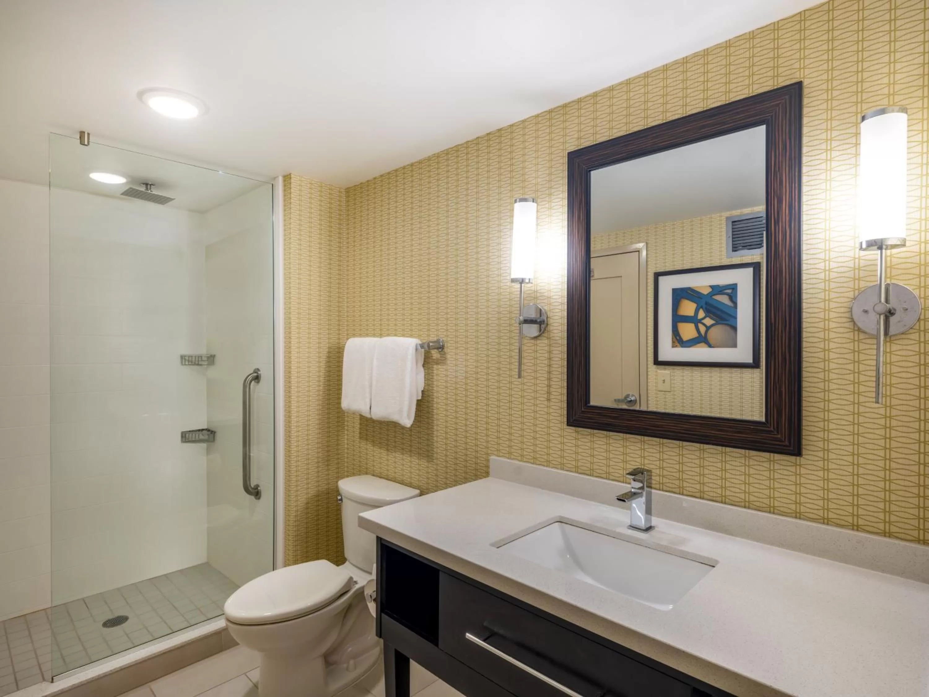 Bathroom in Holiday Inn Greensboro Coliseum by IHG