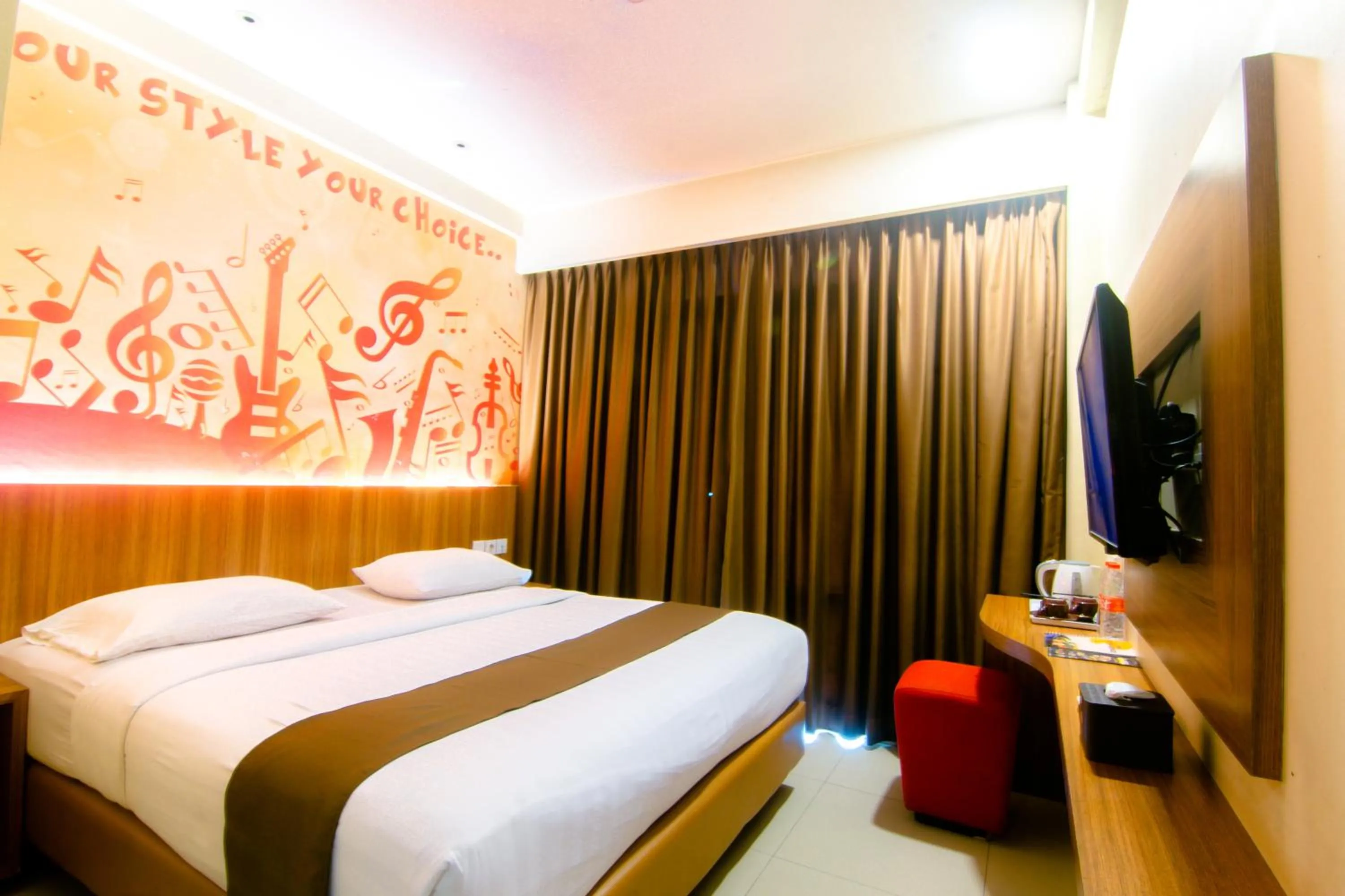 Bed in Front One Hotel Purwodadi