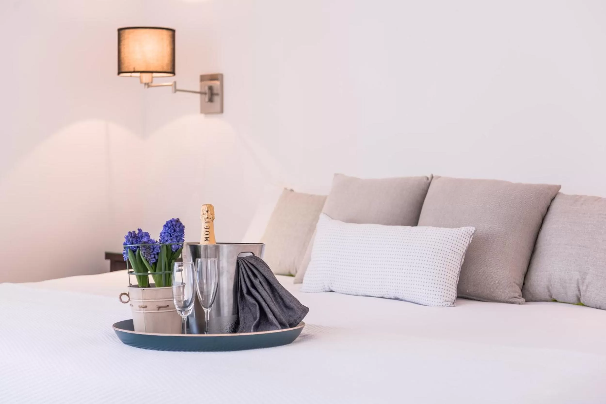 Bed in Fino Hotel & Suites