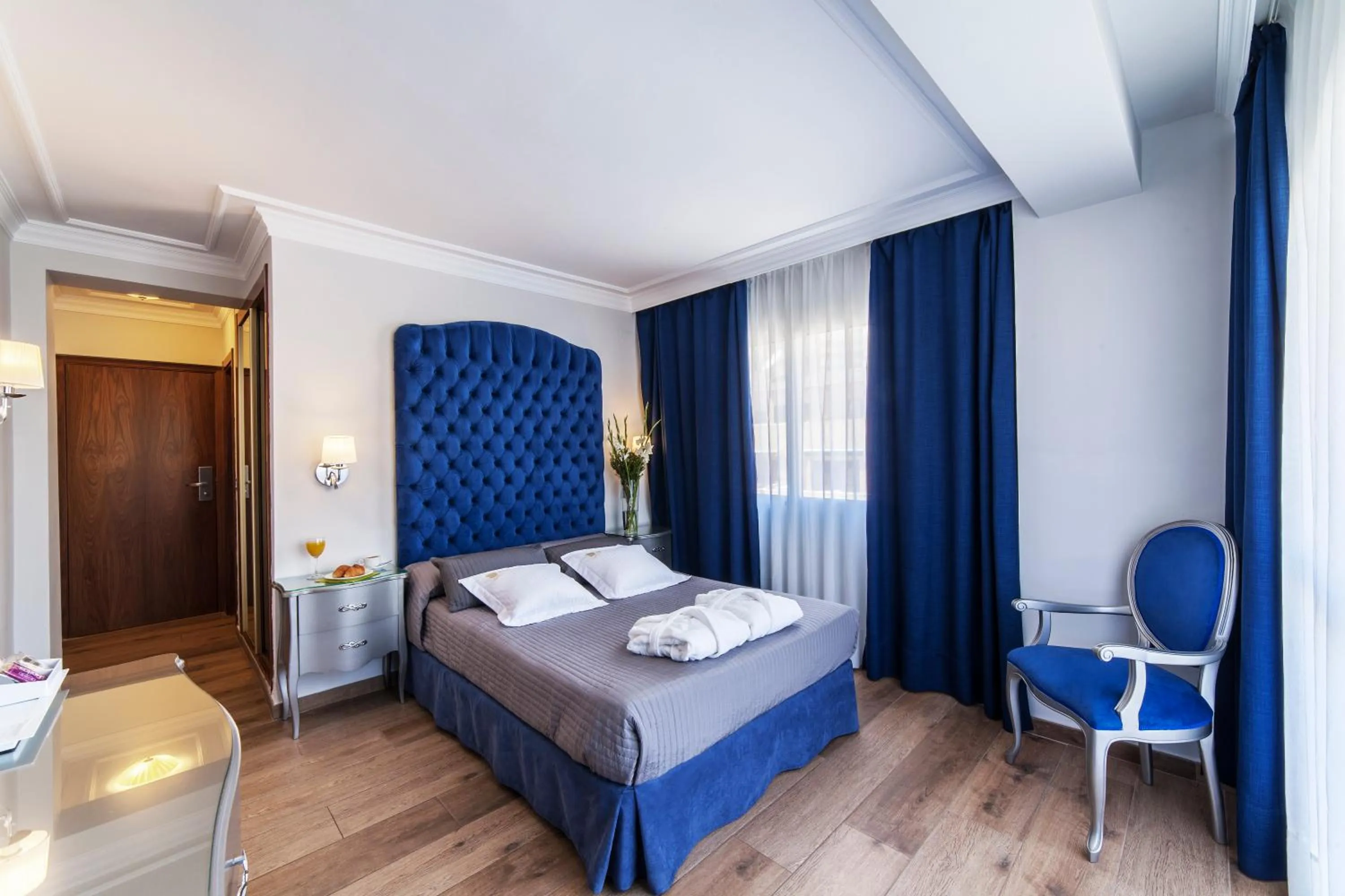 Bed in Essence Hotel Boutique