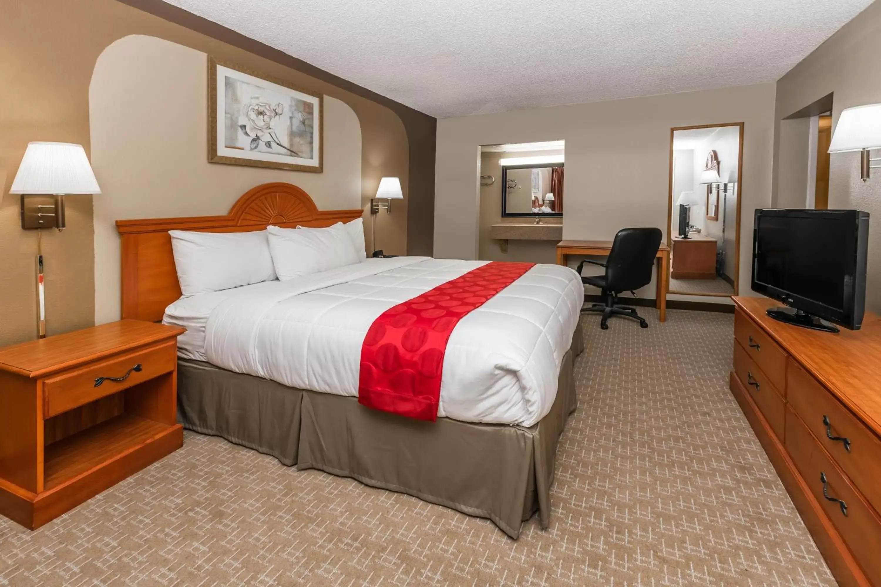 King Room with Roll-In Shower - Mobility Accessible/Smoking in Ramada by Wyndham Odessa Near University of Texas Permian King Room with Roll-In Shower - Mobility Accessible/Smoking in Ramada by Wyndham Odessa Near University of Texas Permian
