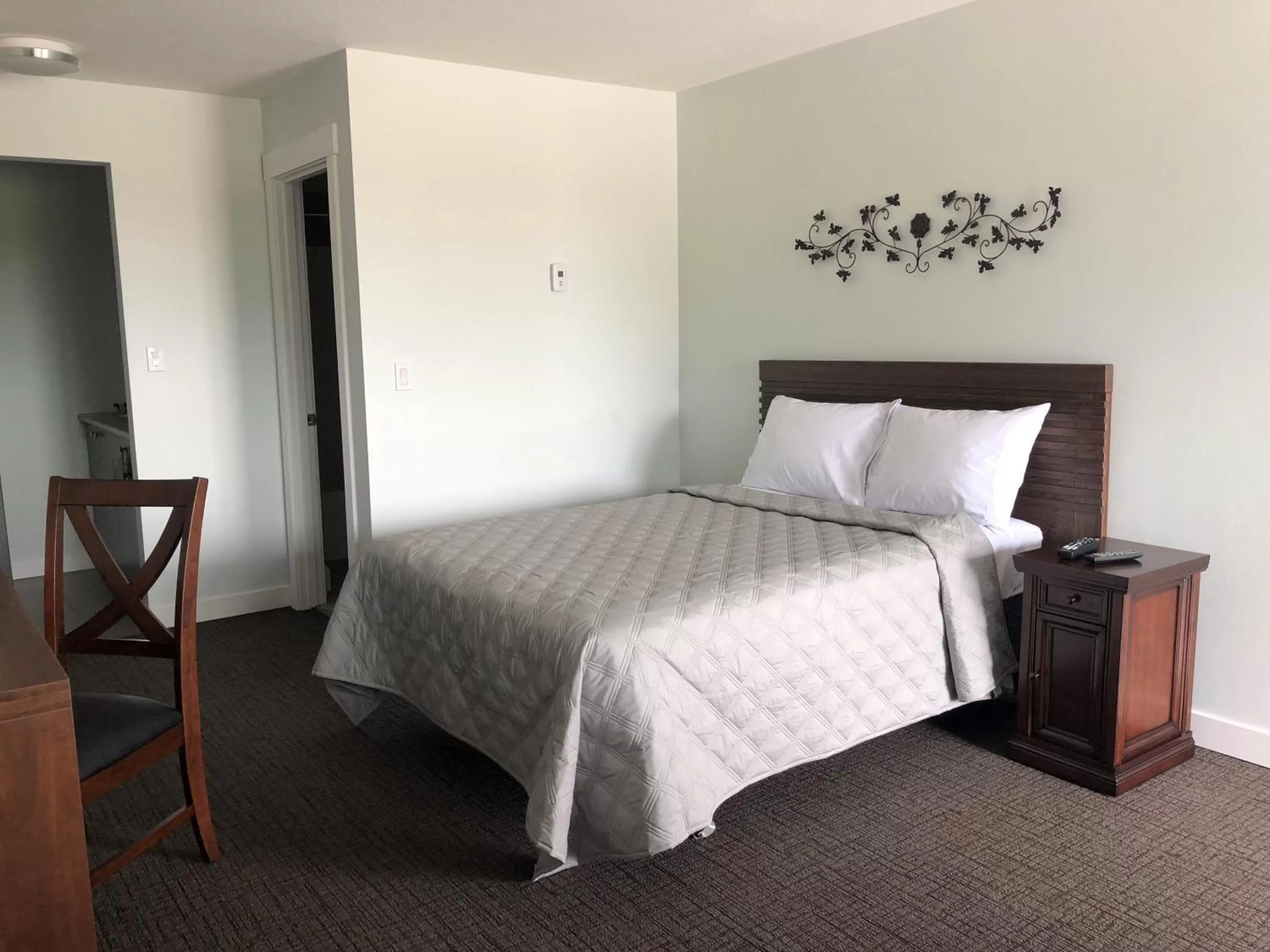 Bed in Onoway Inn and Suites