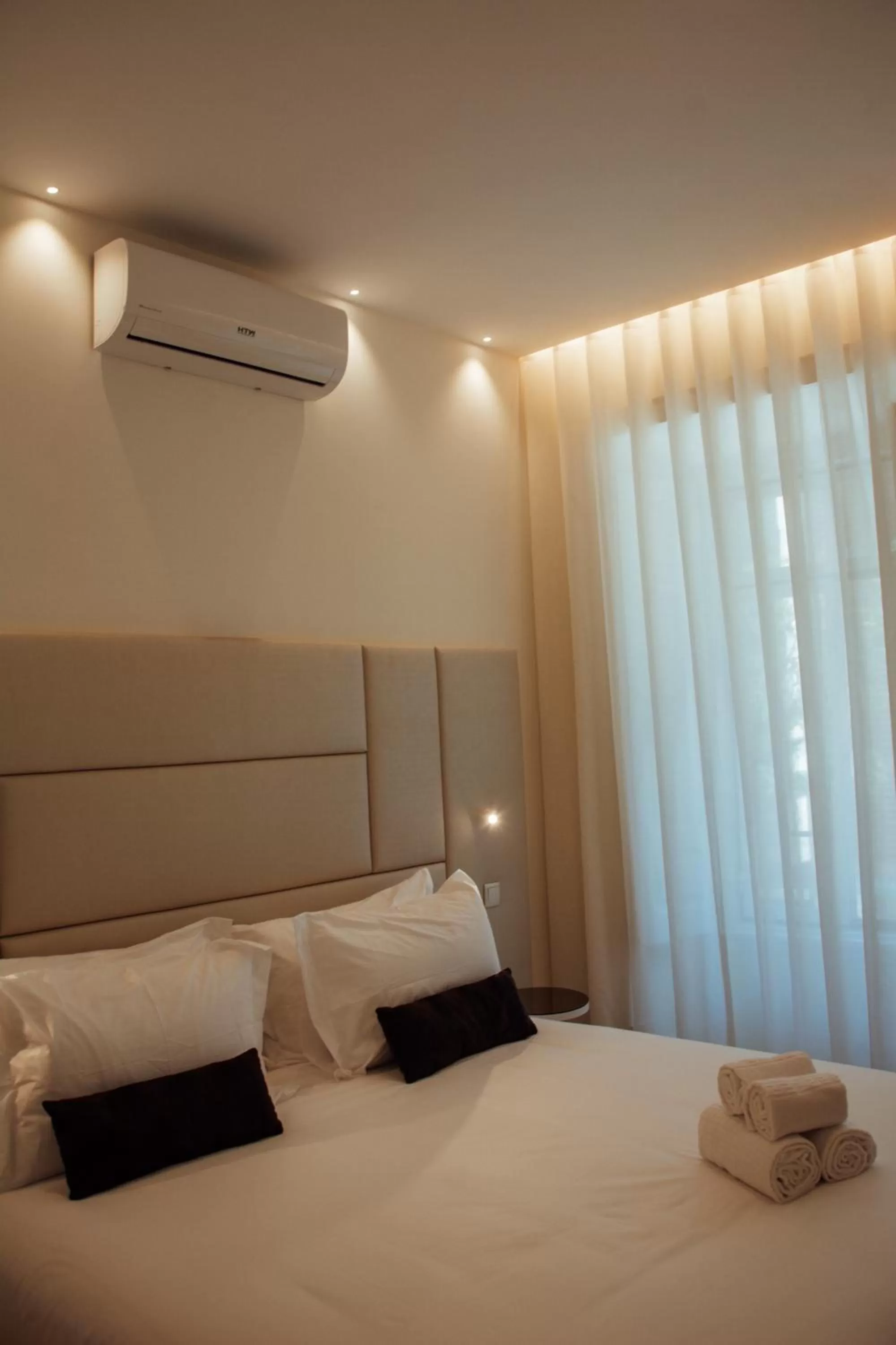 Decorative detail, Bed in Le Premier Lisbon Suites