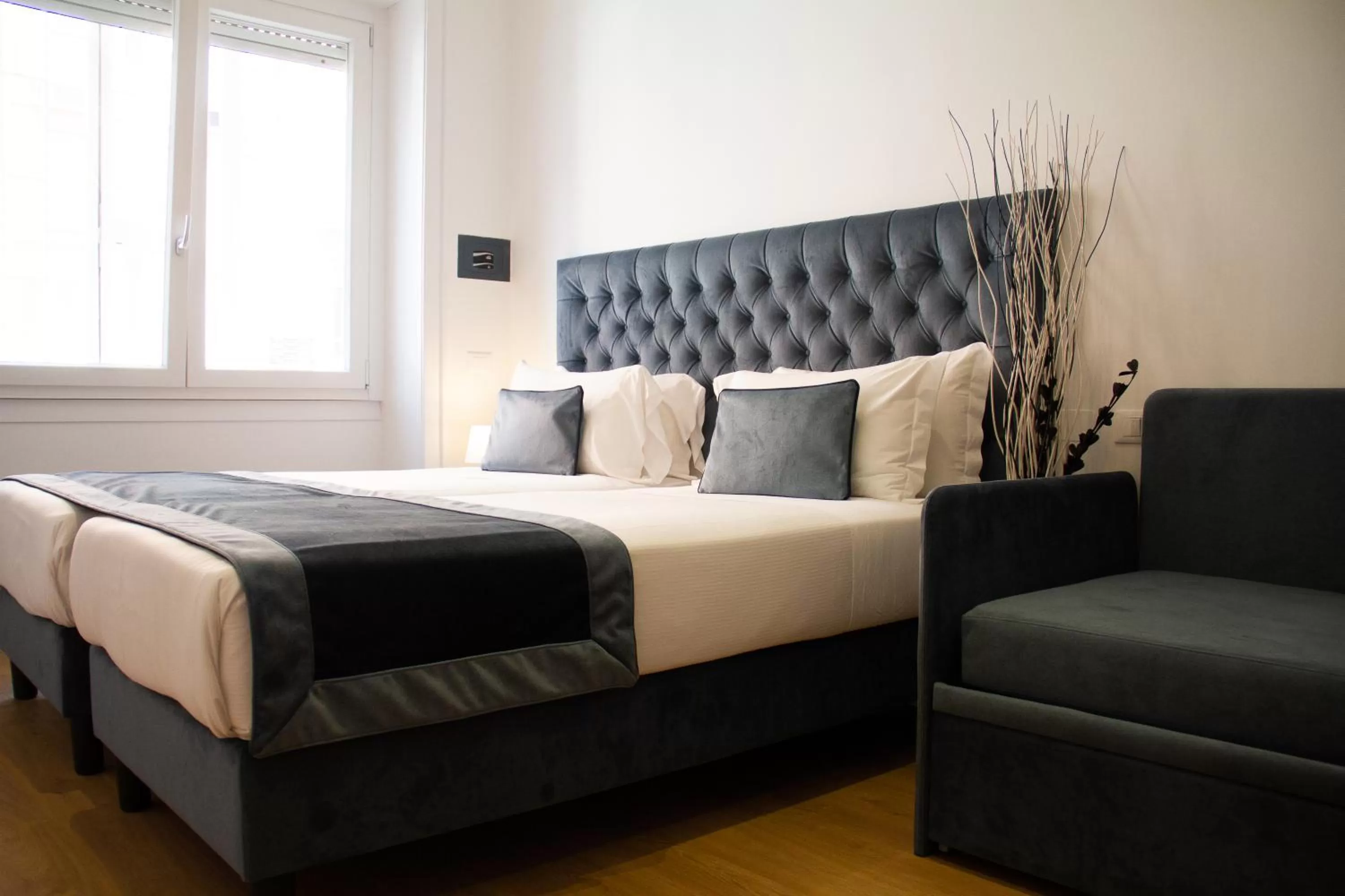 Bed in Michelangelo Vatican Rooms