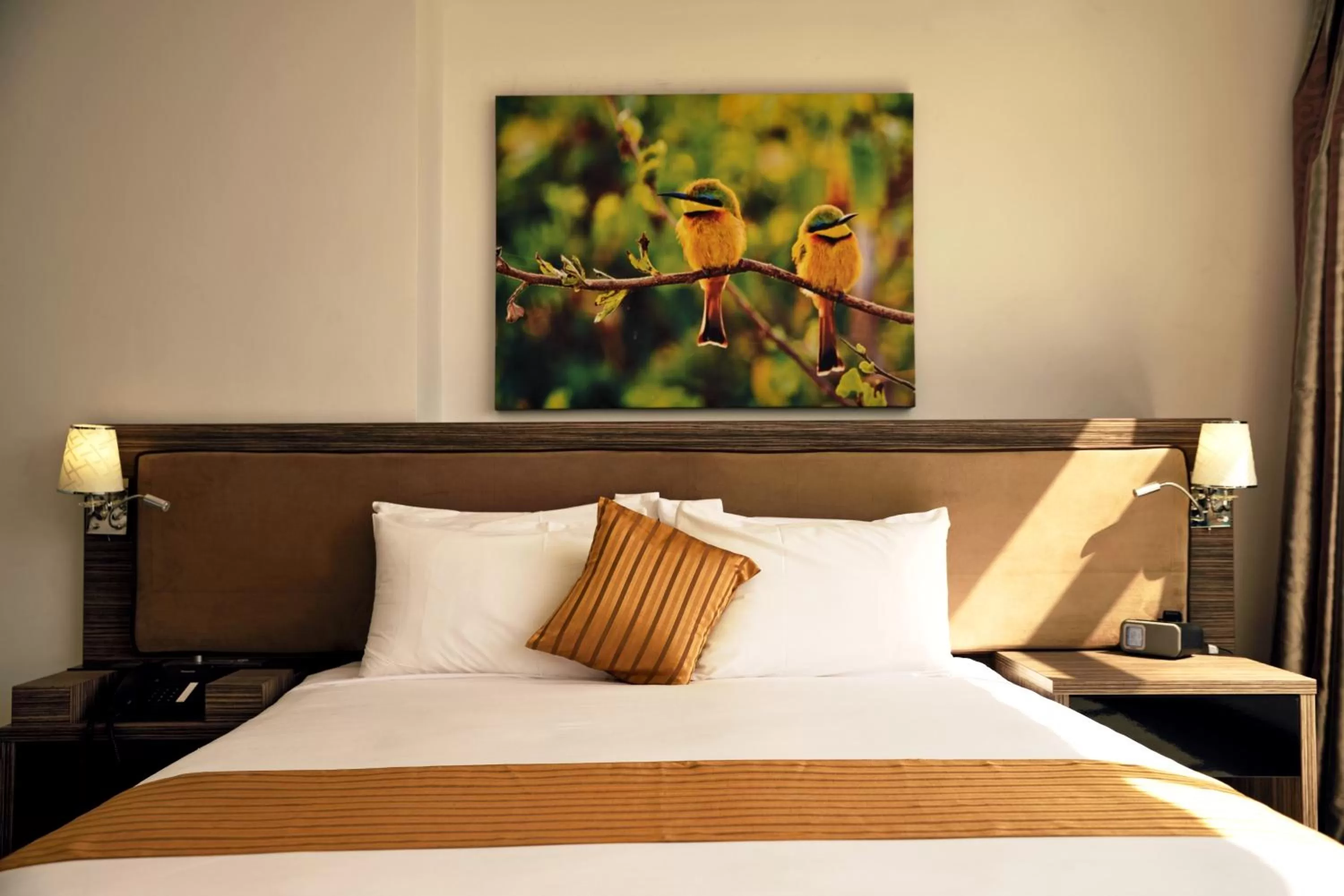 Photo of the whole room, Bed in Golden Tulip Dar Es Salaam City Center Hotel