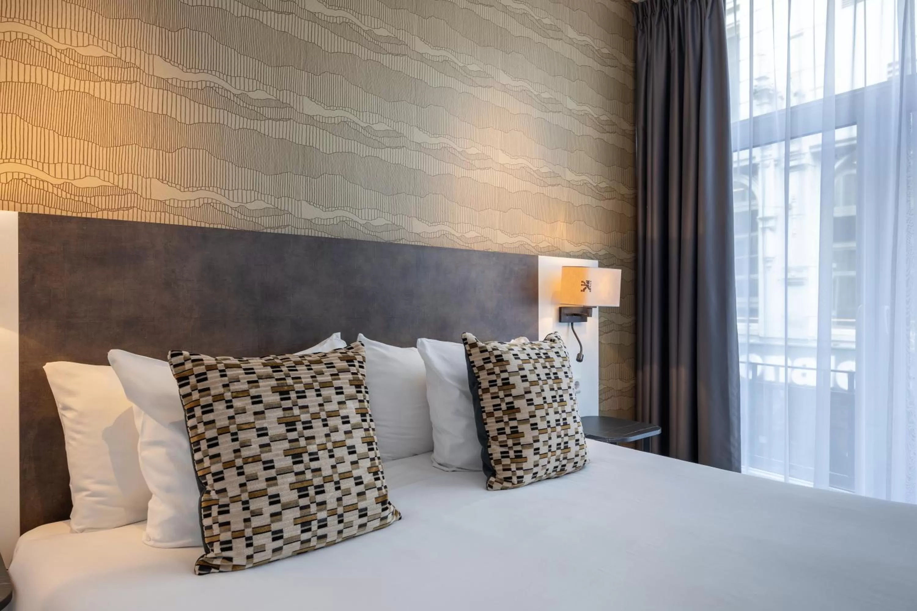 Bed in Hotel Amsterdam De Roode Leeuw