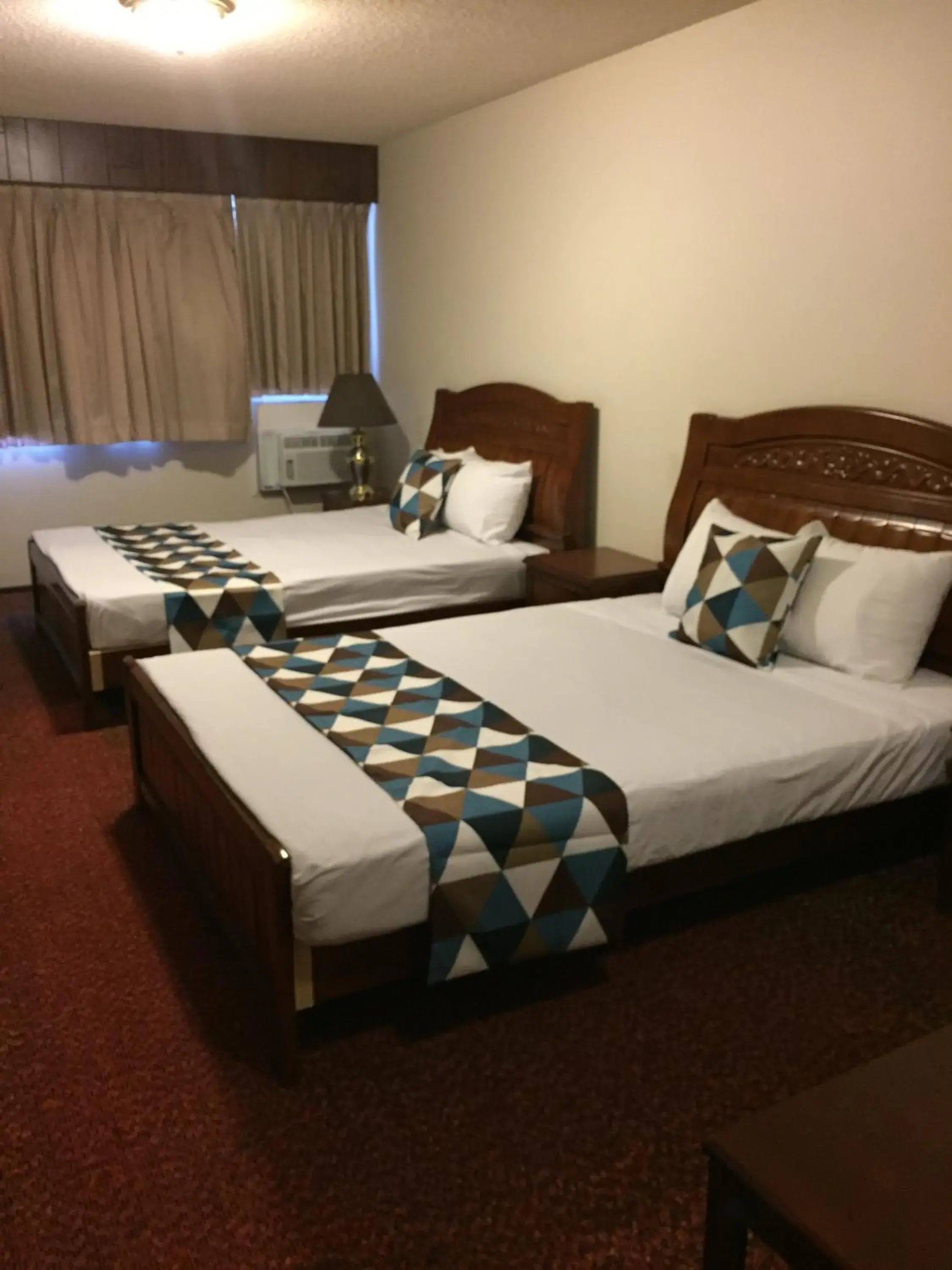 Double Queen Room Rear Facing in Spring Villa Hotel Double Queen Room Rear Facing in Spring Villa Hotel