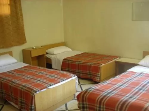 Bed in Mansour Hotel