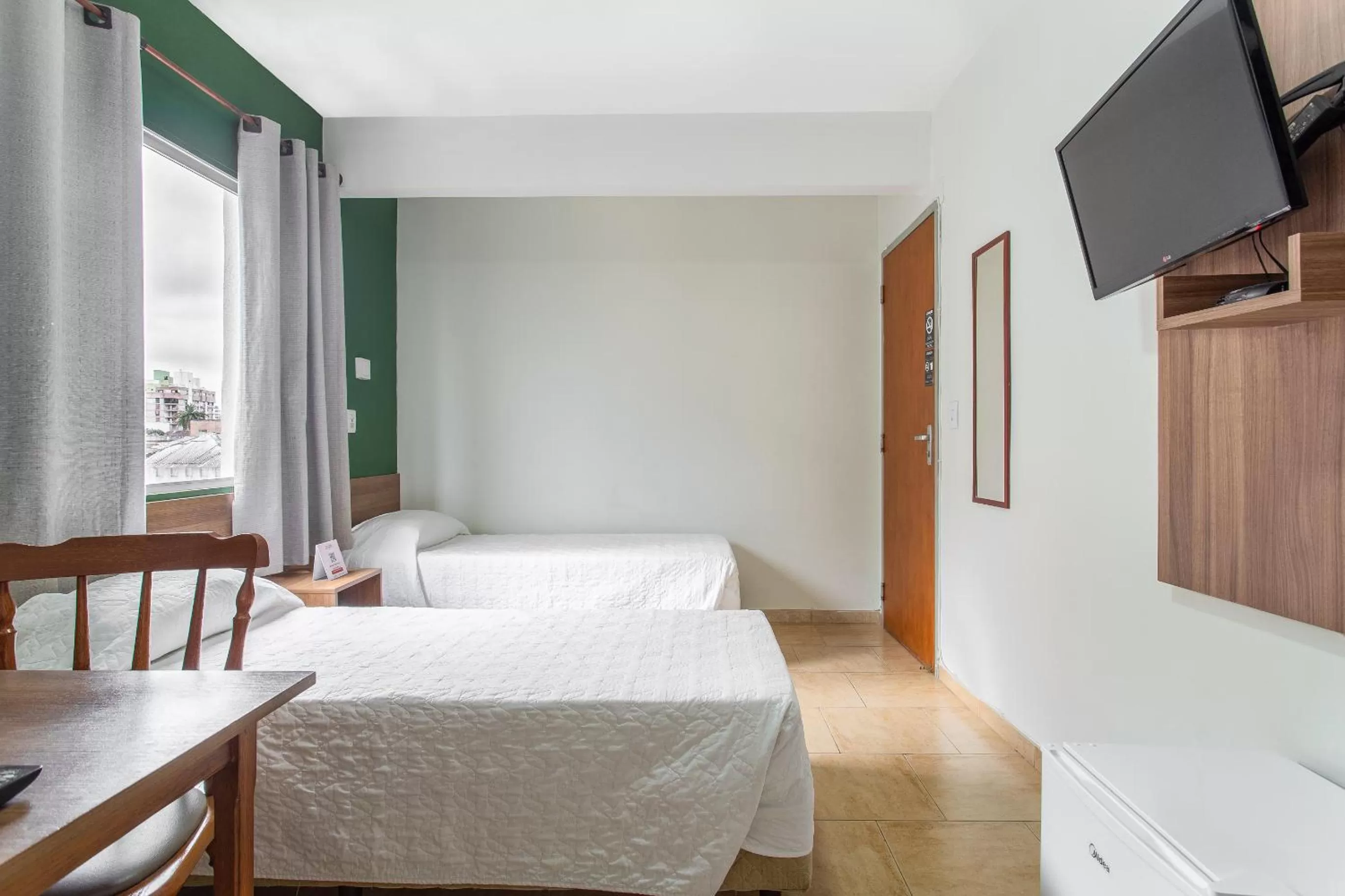 Bed in Hotel Dom Rafael Express