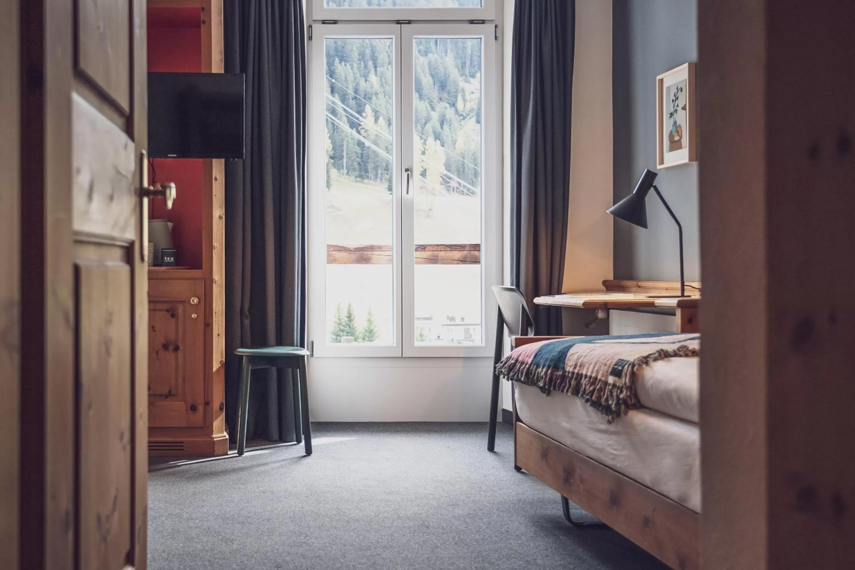 Photo of the whole room, Bed in Hotel Davoserhof by Mountain Hotels