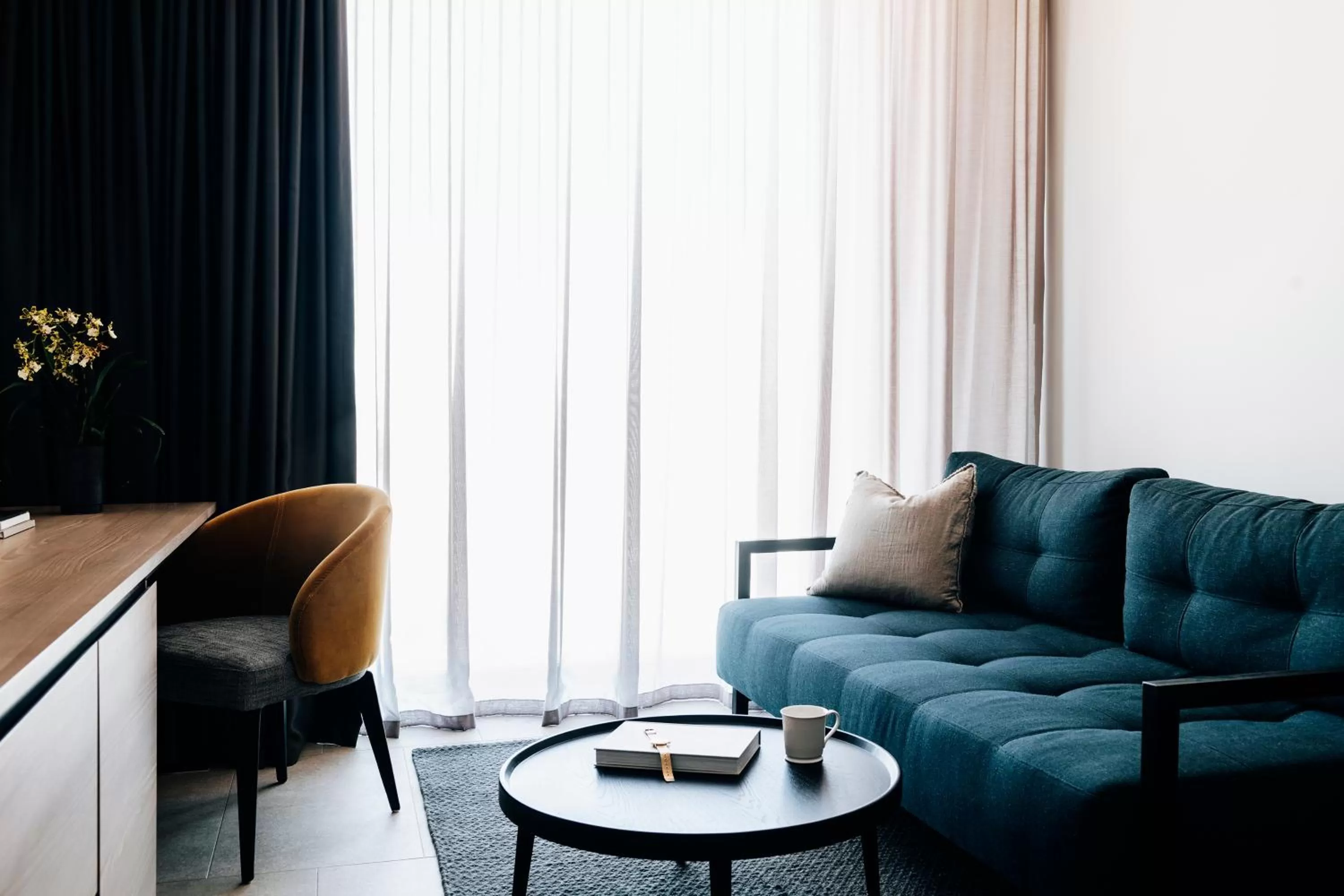 Living room in Novotel Melbourne South Wharf