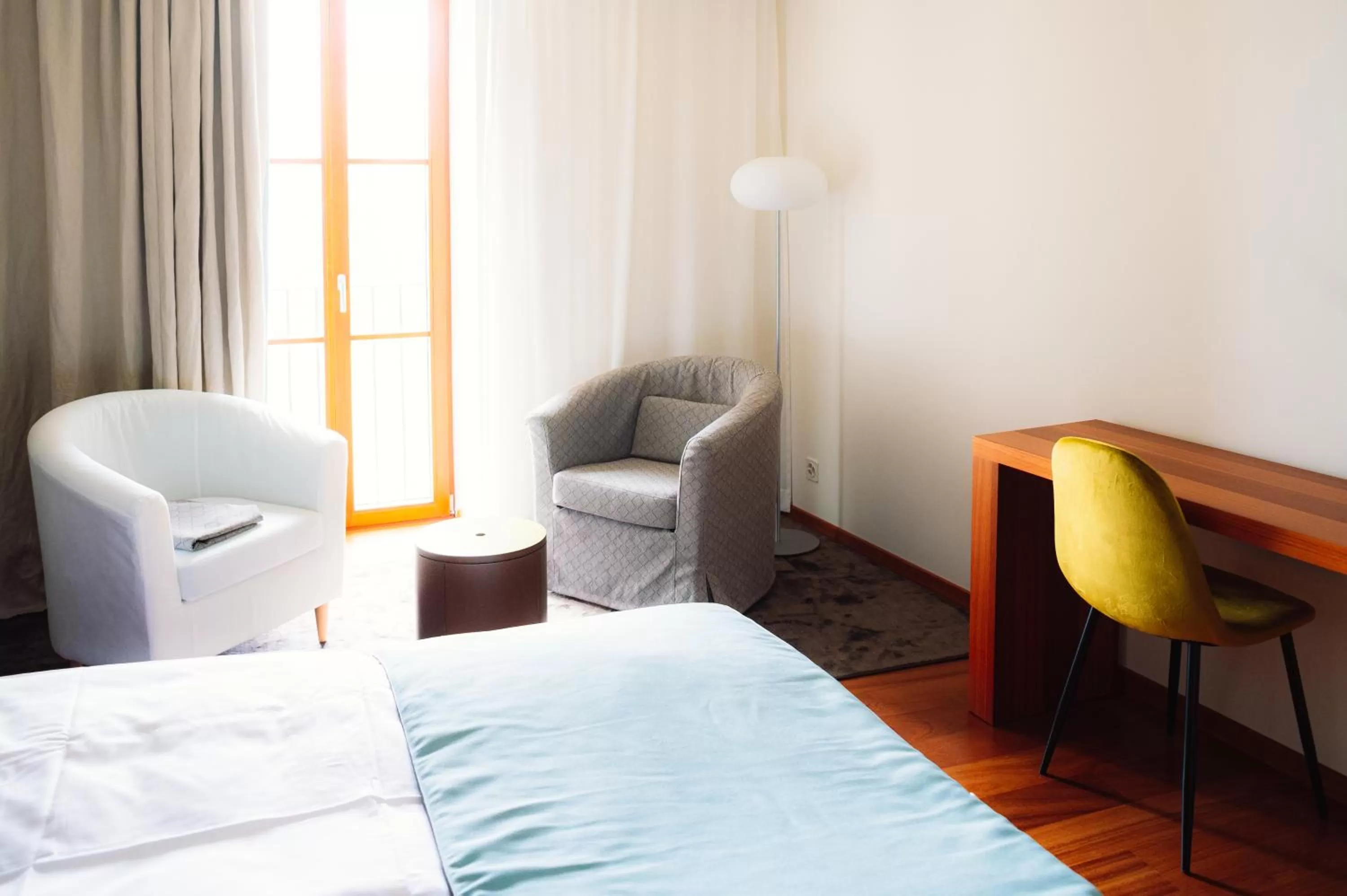 Seating area, Bed in Bigatt Hotel & Restaurant