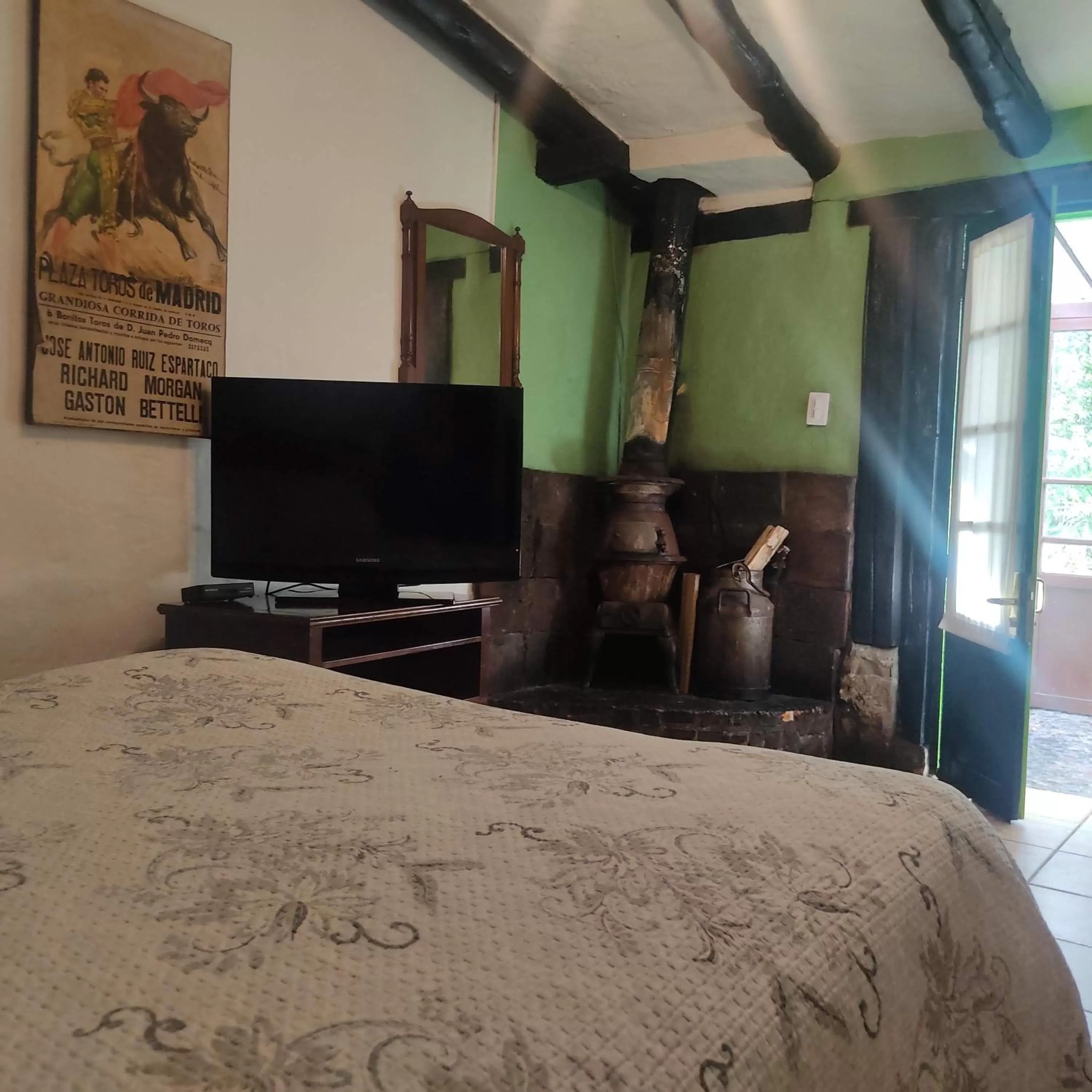Photo of the whole room, Bed in Posada Cafe La Huerta