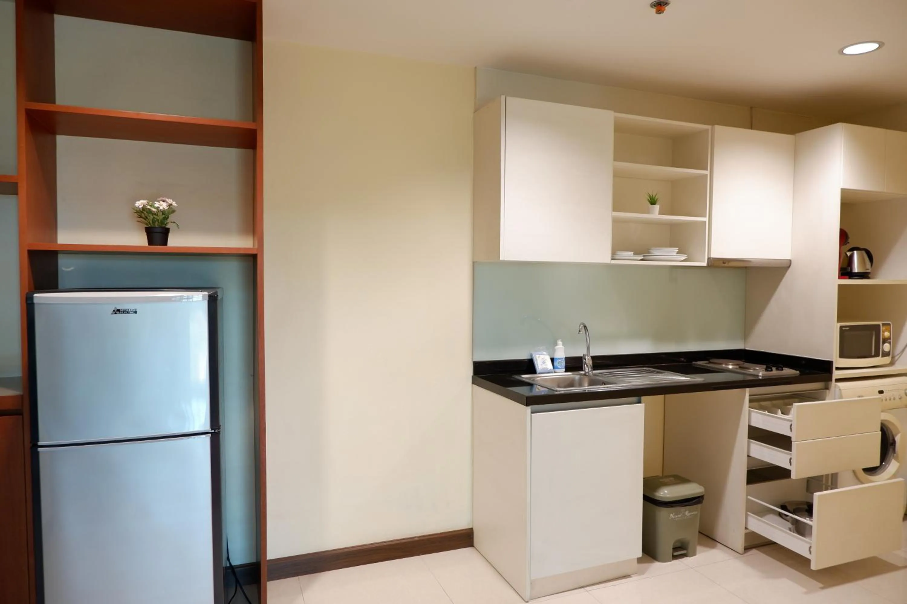 Kitchen or kitchenette in 42Grand Residence