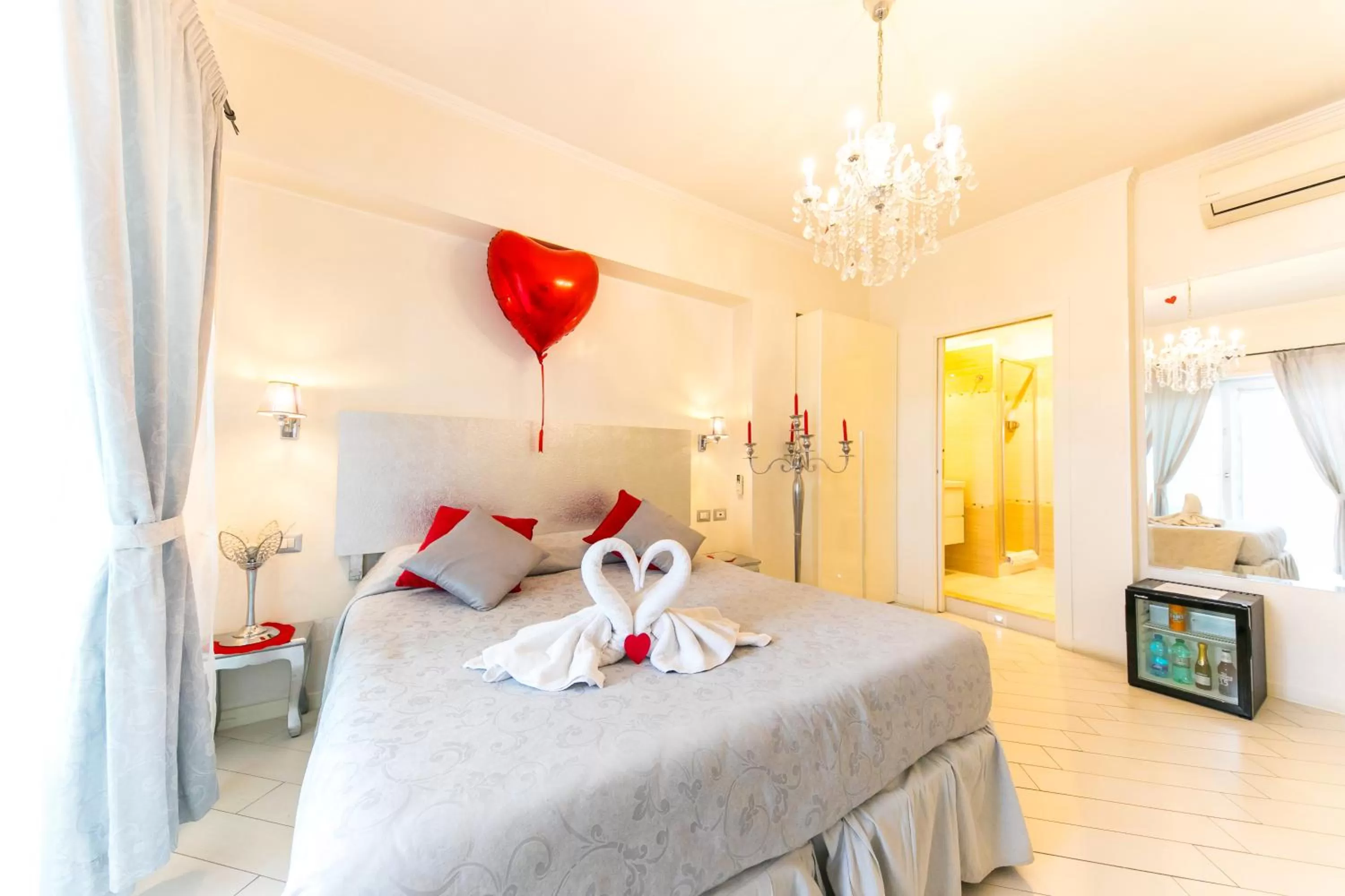 Photo of the whole room, Bed in Suites Roma Tiburtina