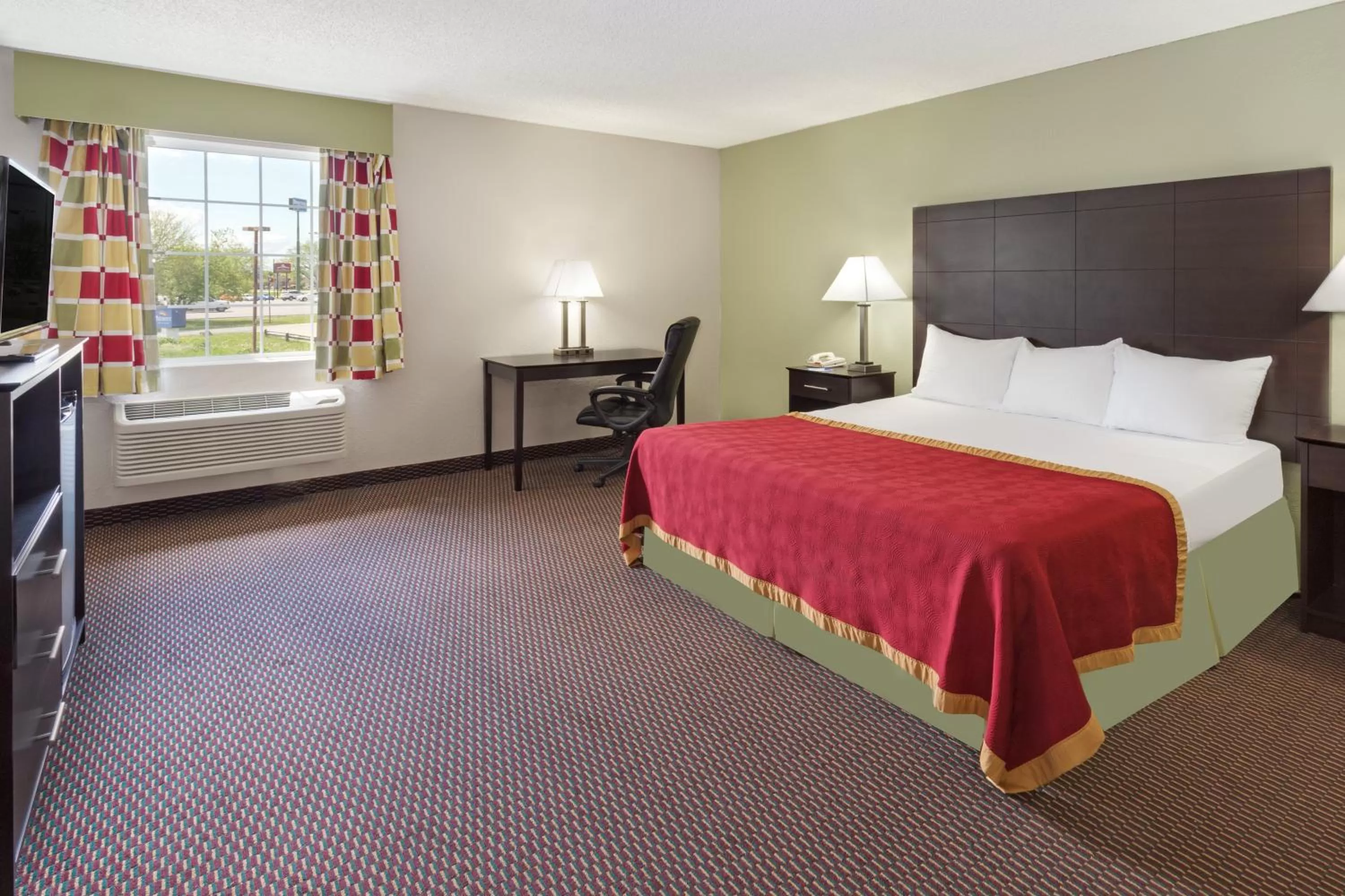 Bed in Baymont by Wyndham Beloit