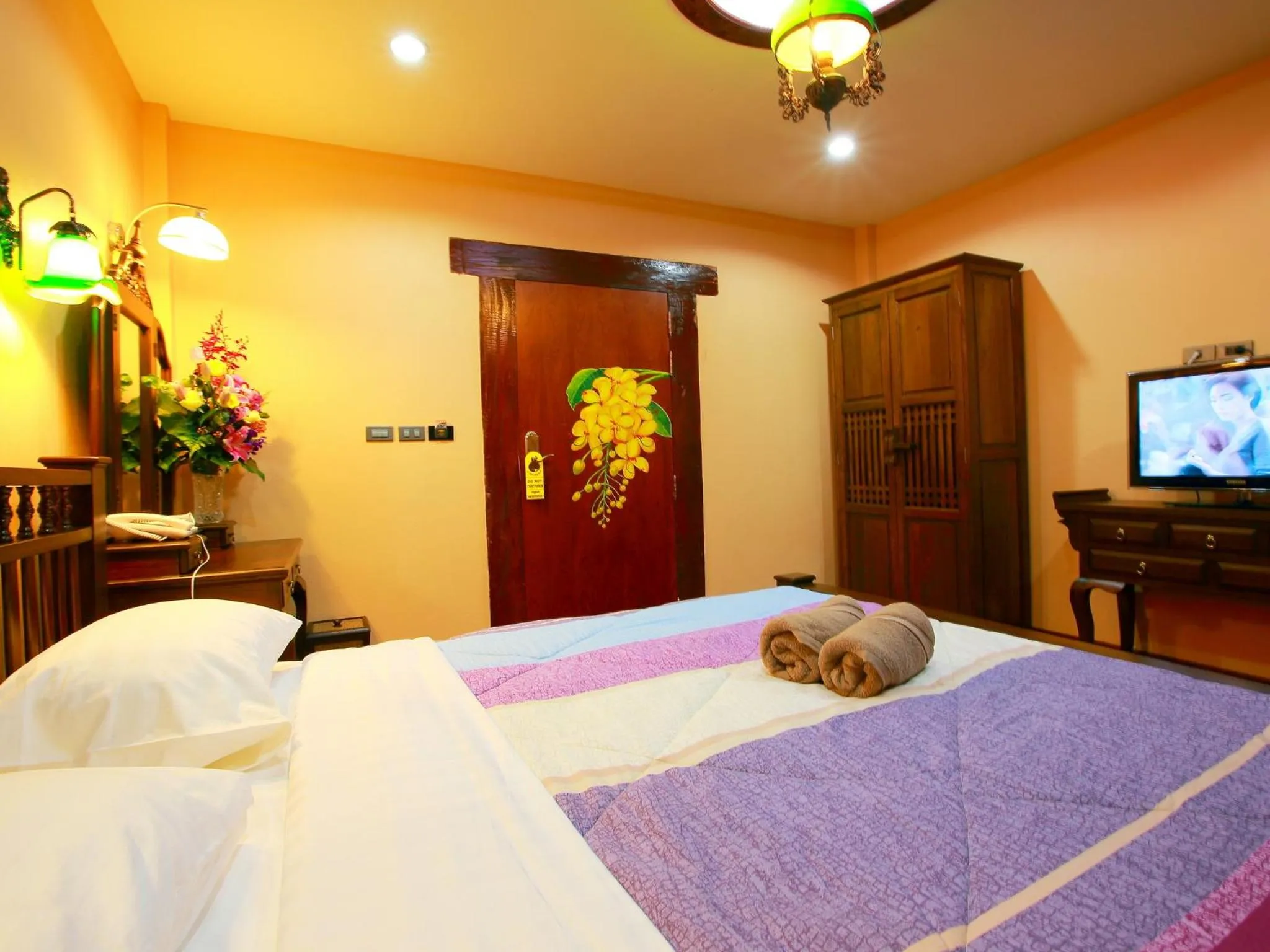 Bed in At Chiang Mai Hotel