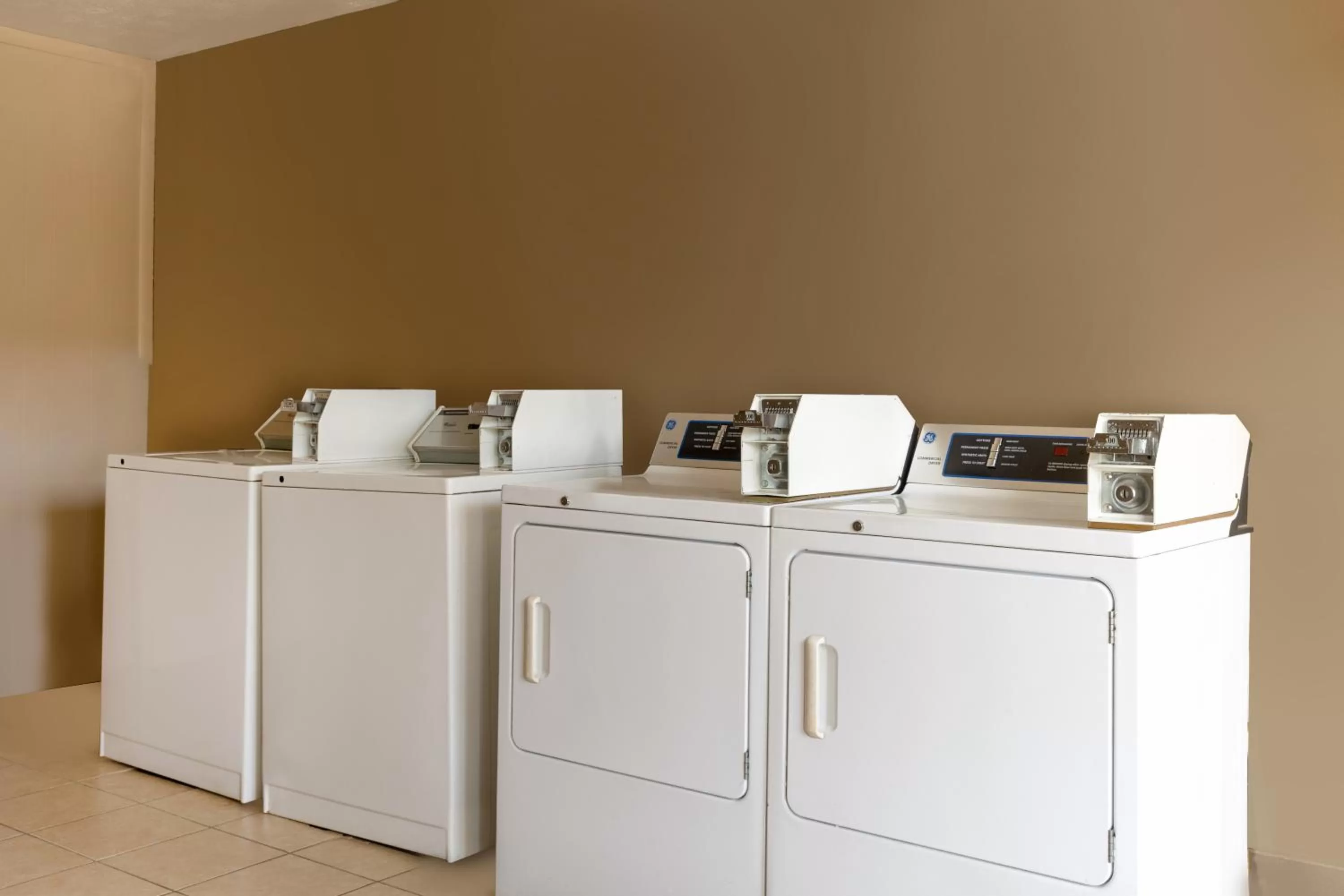 laundry in Super 8 by Wyndham McDonough GA