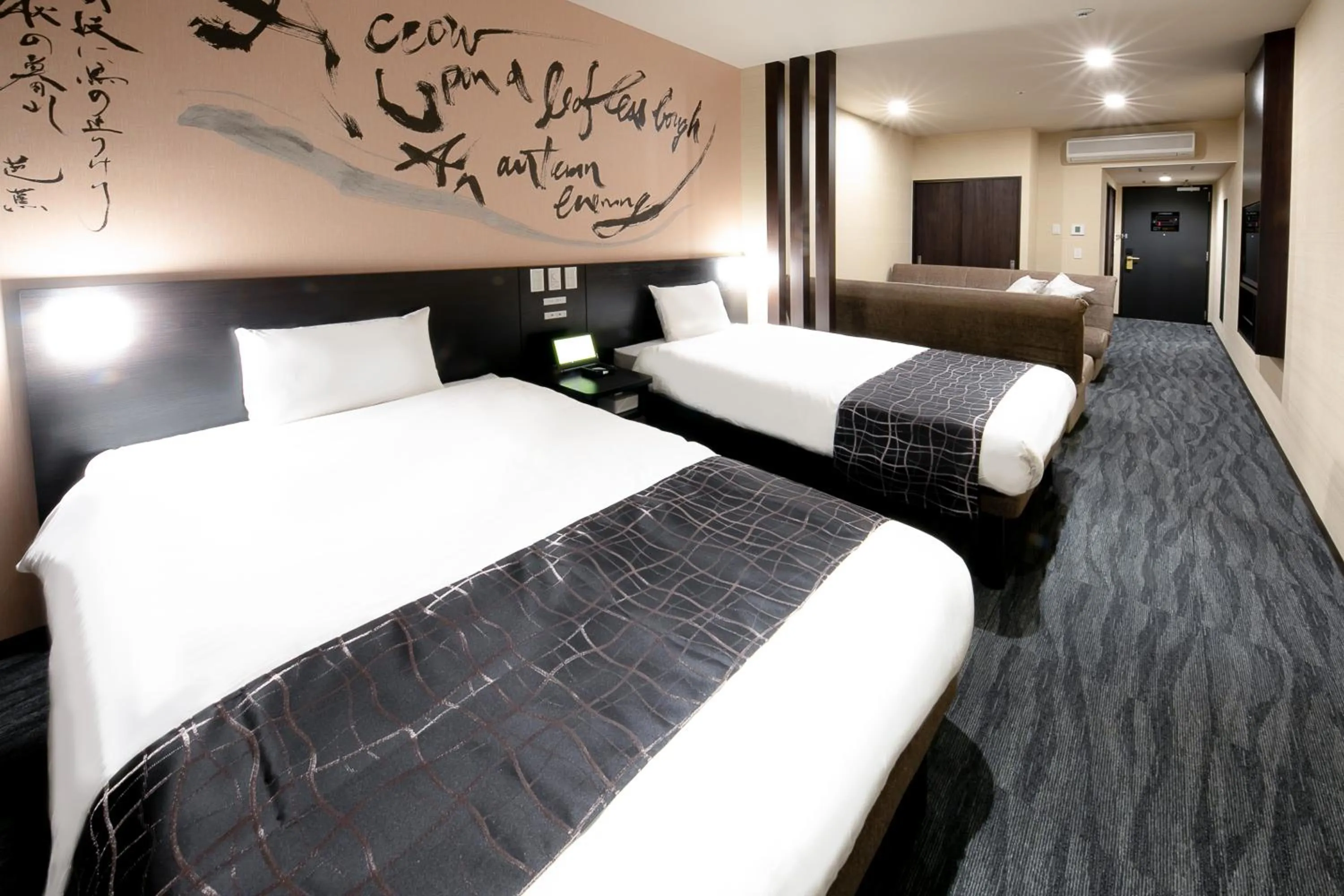 Bed in Sakishima Cosmo Tower Hotel