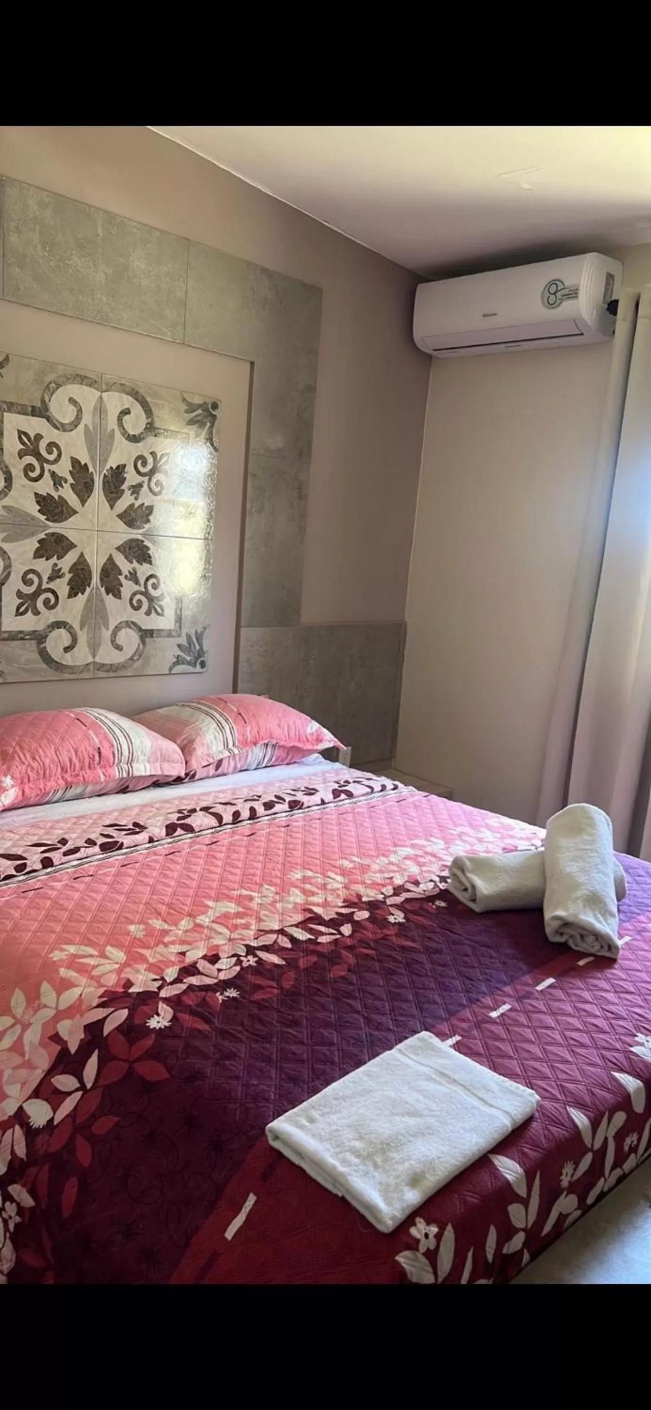 Bed in Curasita colour Appartments