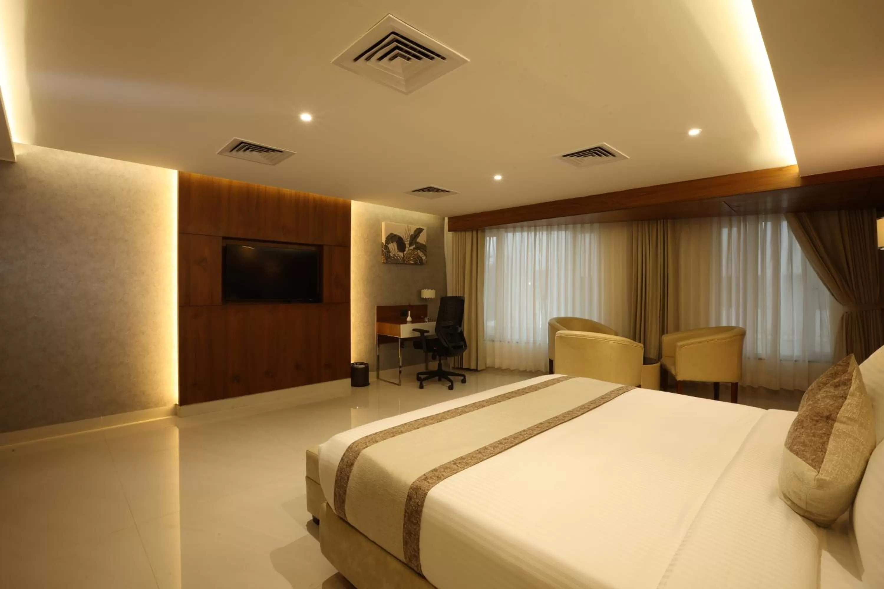 Bedroom, Bed in Royal Plaza Suites by RAK Rooms, Mangaluru