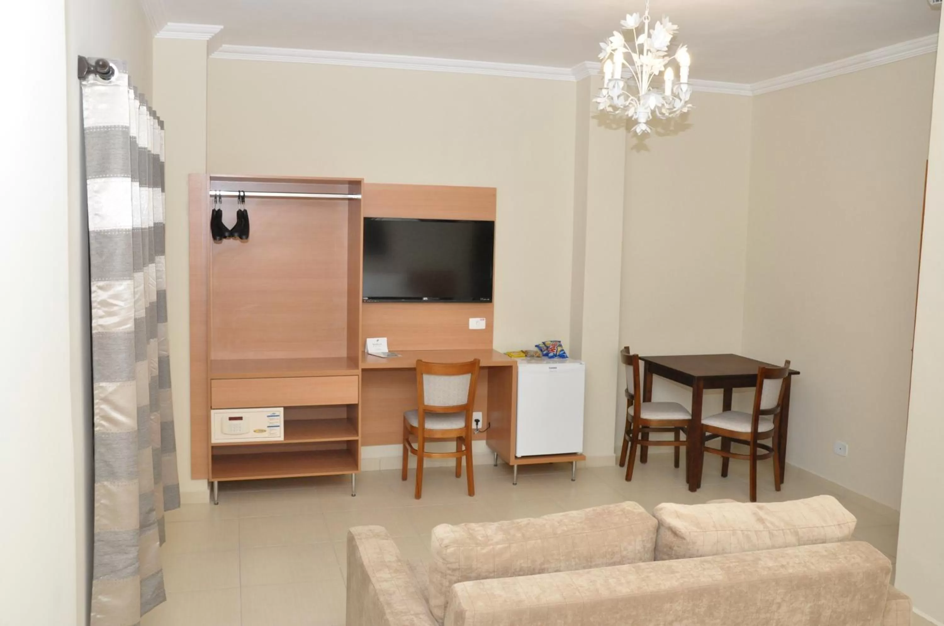 Photo of the whole room in Lotus Hotel - à 6 km do Santuário de Aparecida-SP