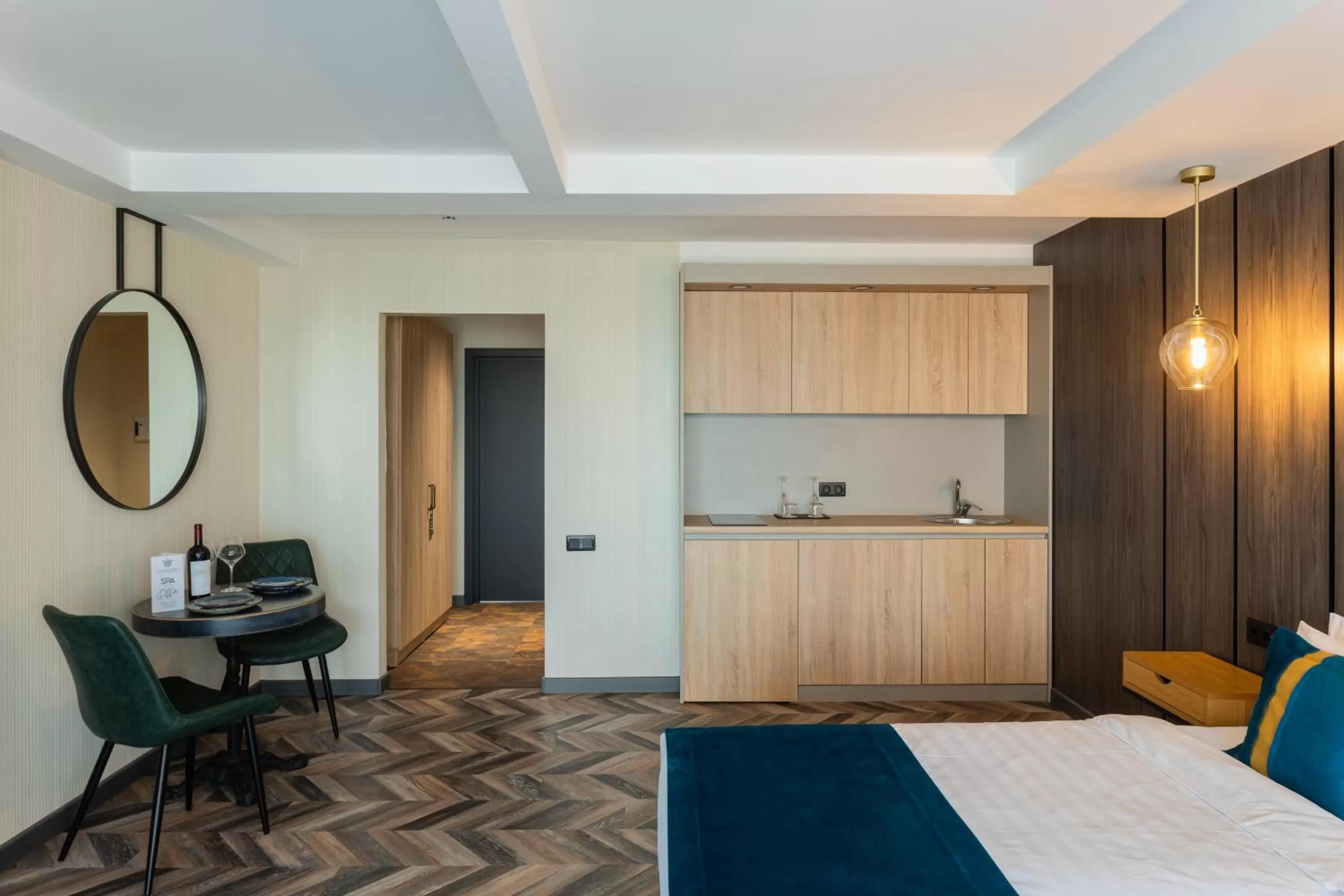 Kitchen or kitchenette, Bed in Tulip Residence & Spa Hotel