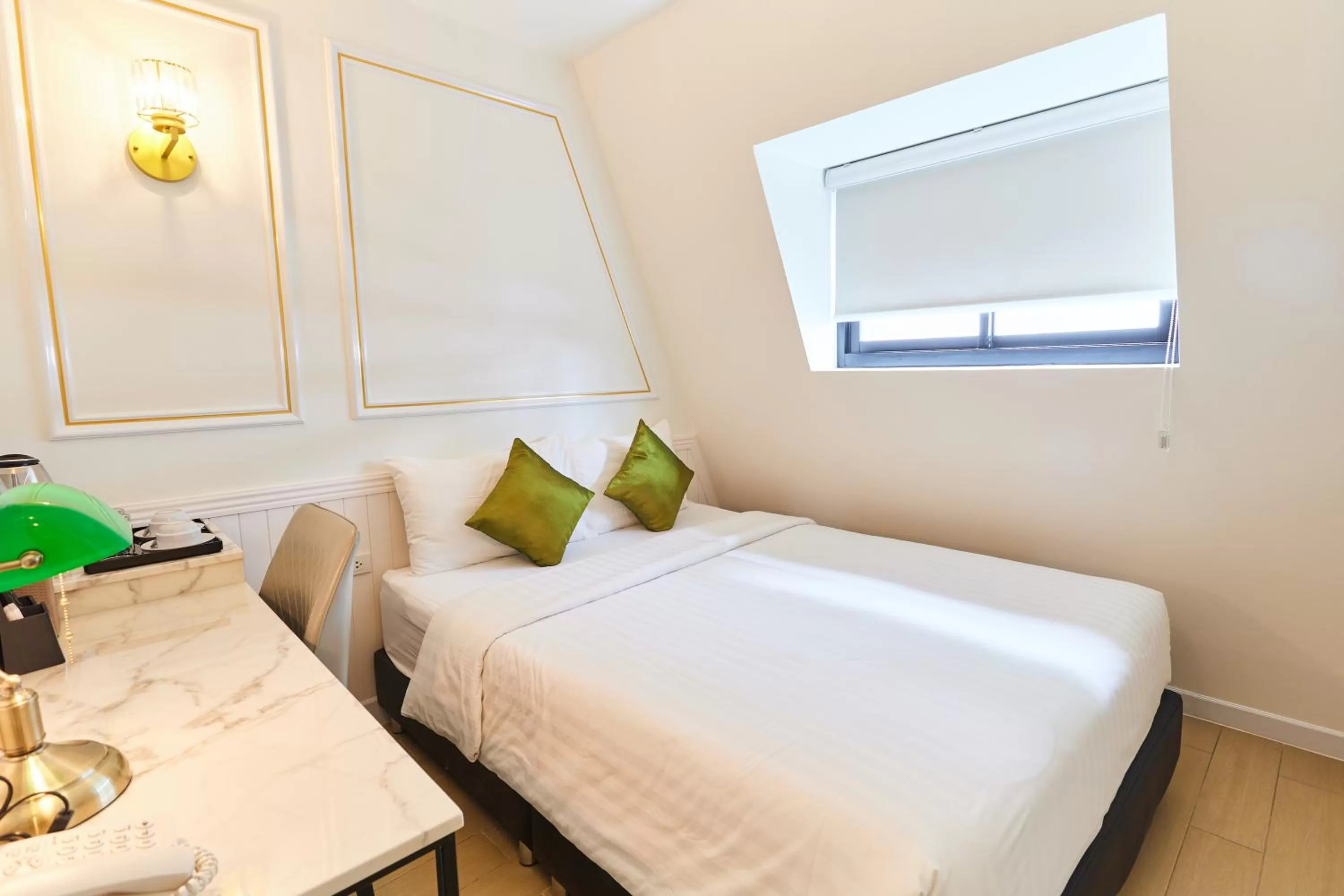 Bed in Rose Apple Hotel