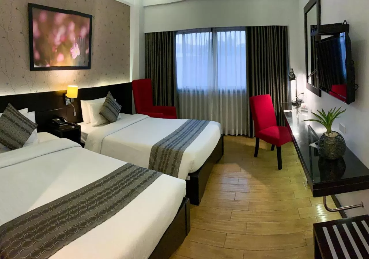 Bed in Venus Parkview Hotel