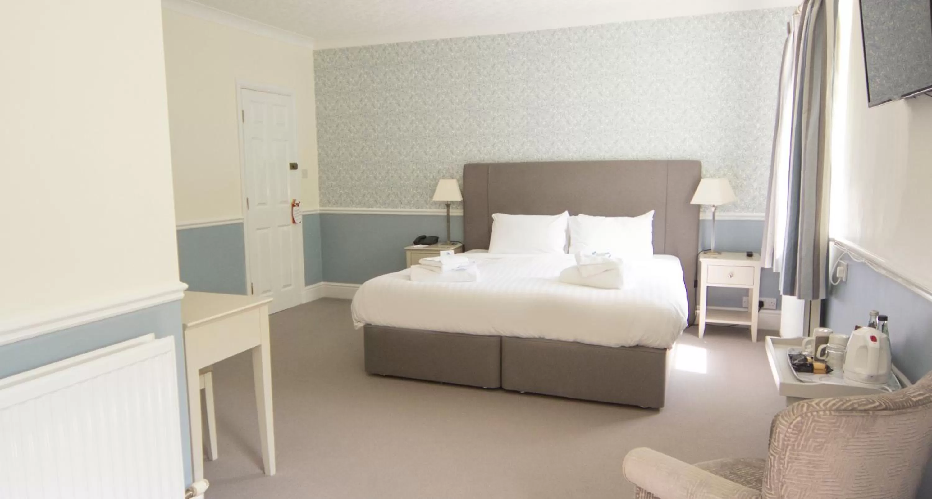 Bed in The White Lodge Hotel