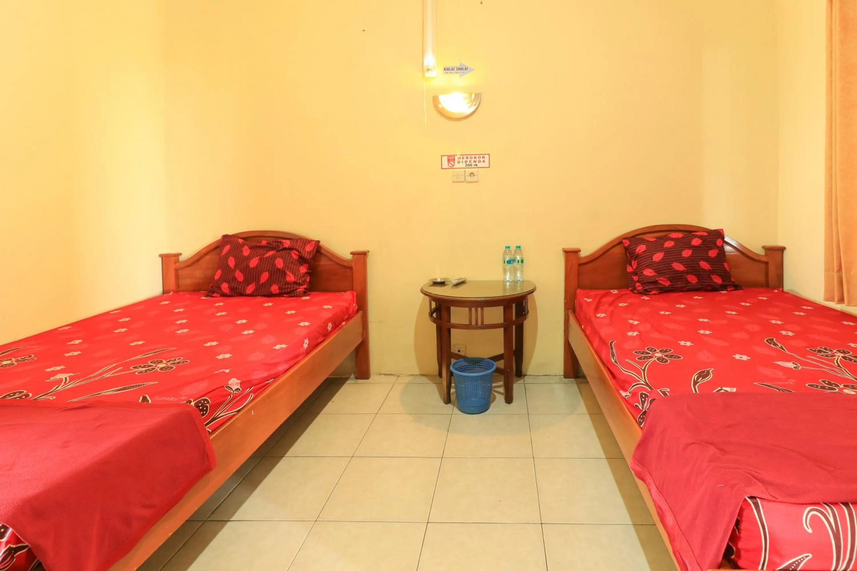 Bed in Penginapan Pondok Rizqi Syariah