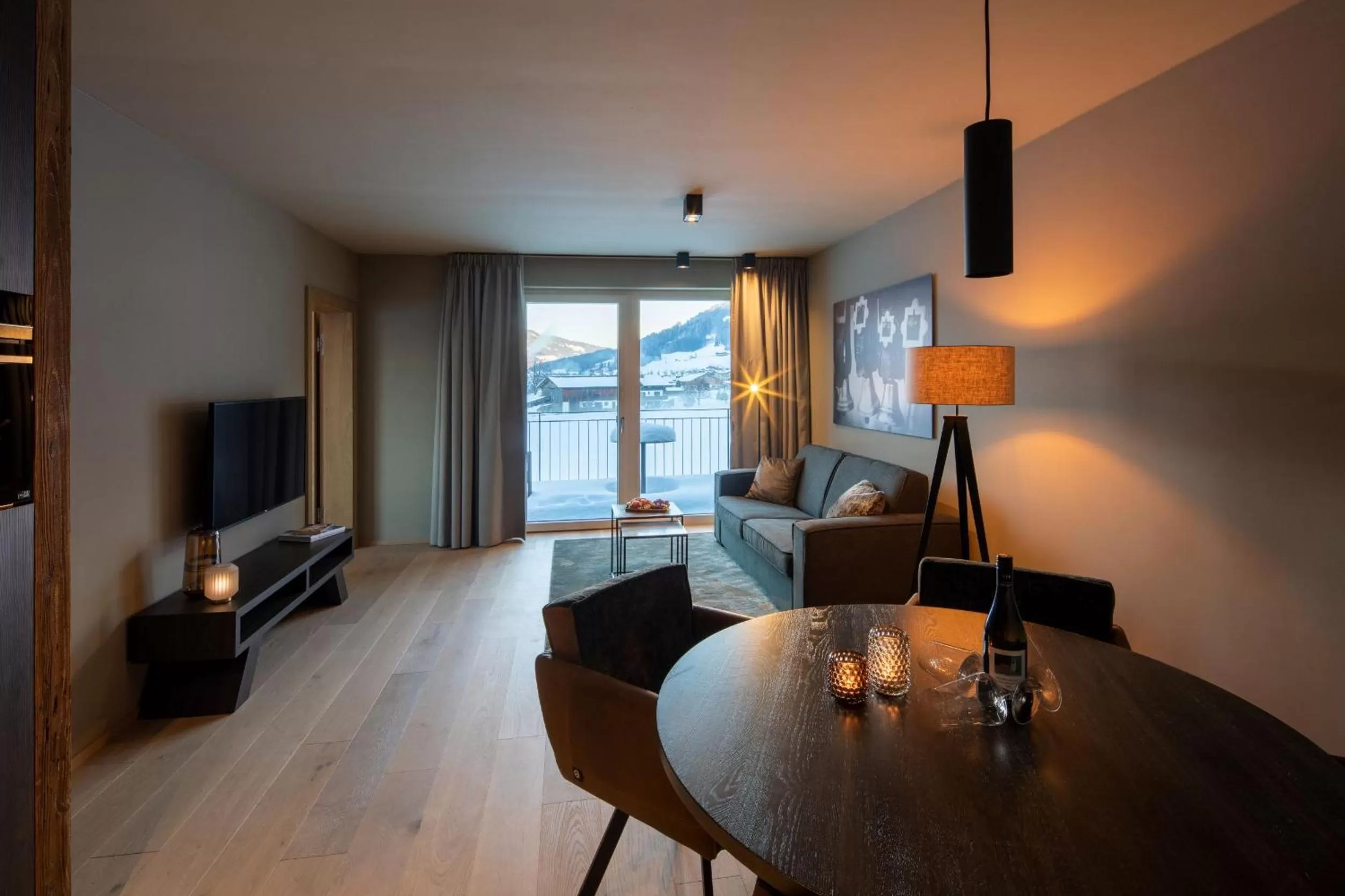 Living room in Berg & Golf Resort Westendorf by ALPS RESORTS